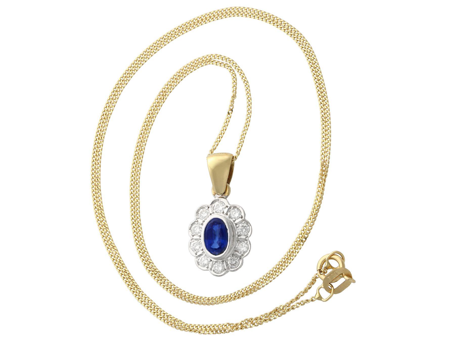 A fine and impressive vintage 0.57 carat natural blue sapphire and 0.40 carat diamond, 18 karat yellow gold, 18 karat white gold set pendant; an addition to our vintage jewelry and estate jewelry collections.

This impressive sapphire and diamond