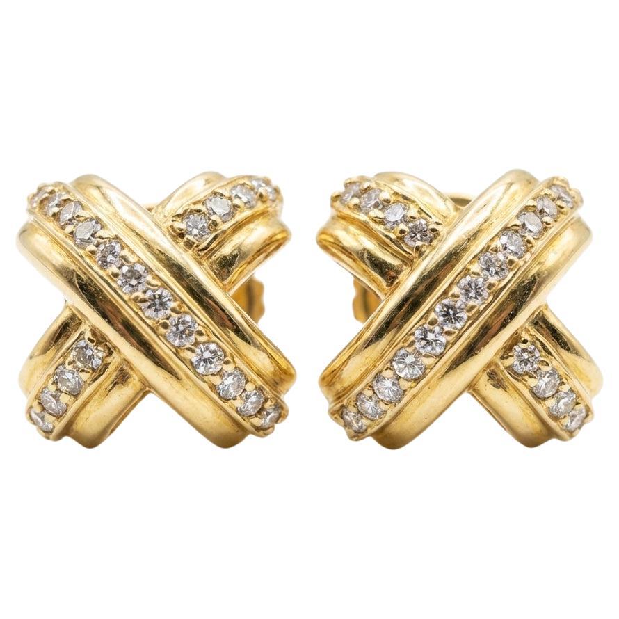 How do you clean Tiffany silver knot earrings?