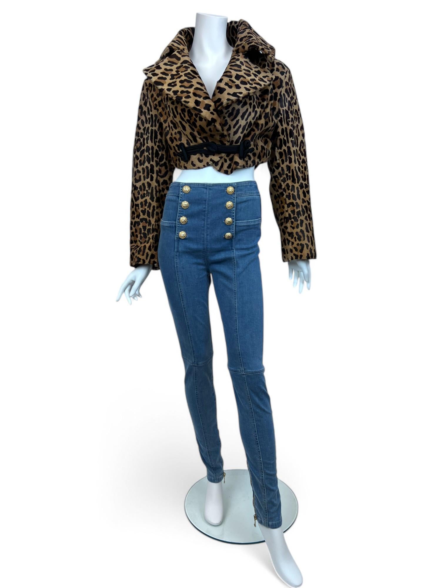A rare and iconic piece from the 1991 runway, this Azzedine Alaïa Leopard Calf Leather Cropped Jacket is a true collector’s item. Crafted from luxurious leopard-print calf leather, the jacket embodies the designer’s signature mastery of structure