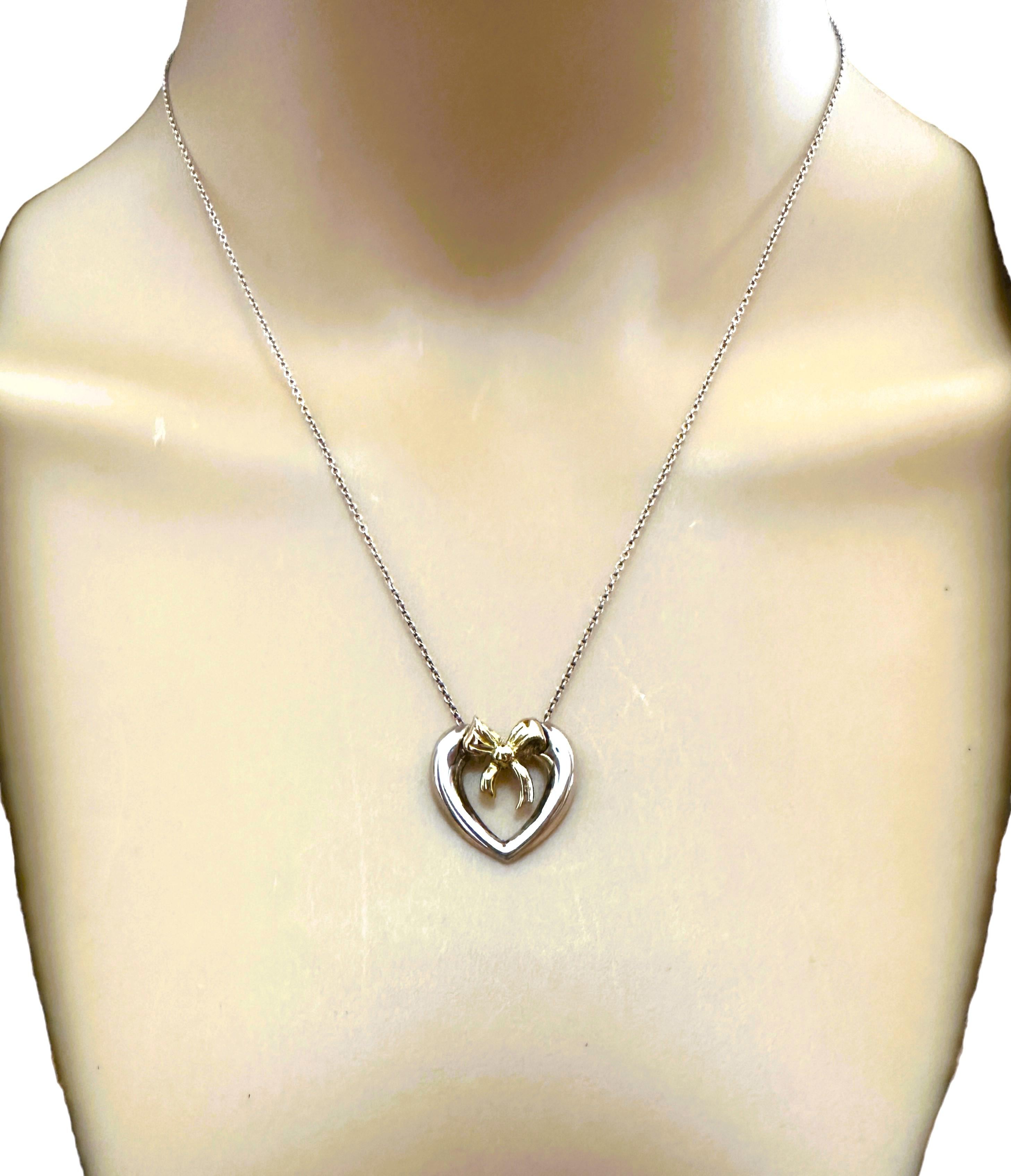 Vintage 1991 Tiffany & Co. 18K Gold Bow Sterling Silver Heart Necklace In Excellent Condition In Eagan, MN