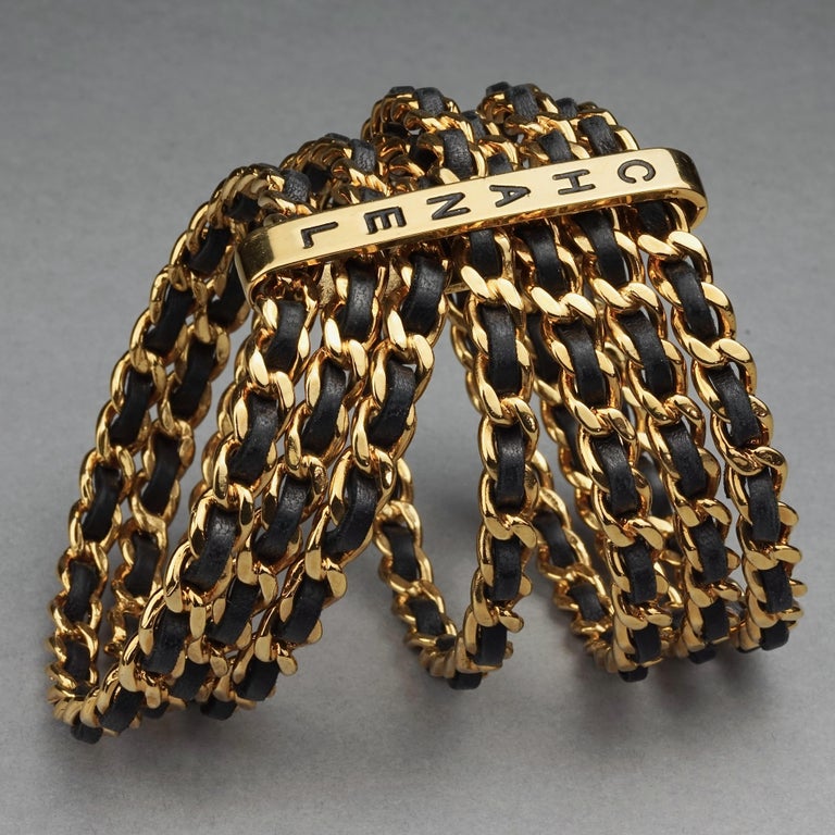 Chanel: A Gold Seven Charm Bracelet 1970s