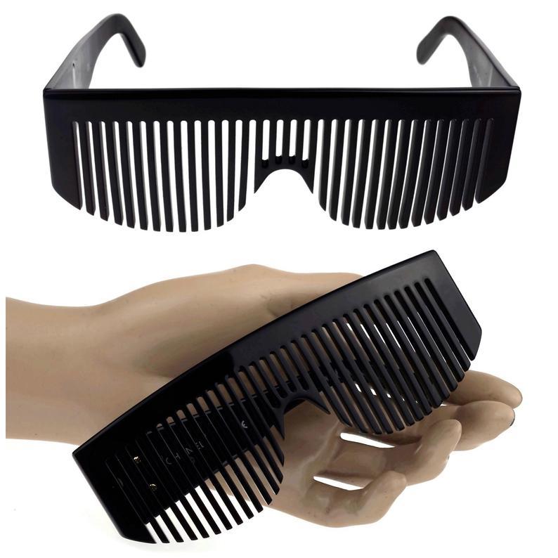 Vintage 1993 CHANEL Logo Comb Futuristic Sunglasses As Seen On Lady Gaga

Measurements:
Height: 2 inches (5.1 cm)
Frame Width: 5.51 inches (14 cm)
Temples:  5 inches (12.7 cm)

As seen on Lady Gaga. These are the most wanted Chanel Sunglasses and