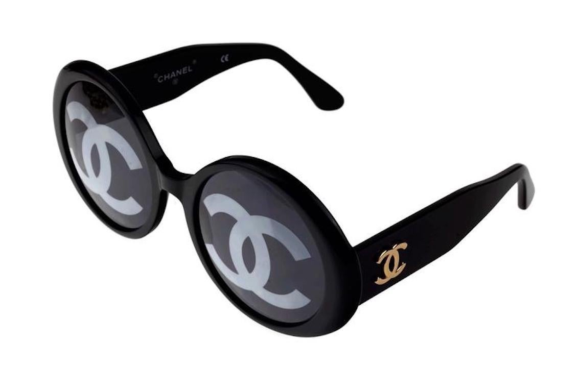 Vintage 1993 Iconic CHANEL CC Lenses Black Sunglasses

Measurements:
Height: 2.40 inches (6.1 cm)
Frame Width: 5.66 inches (14.4 cm)
Temples: 4.72 inches (12 cm)

Similar model as seen on Kate Moss.
From CHANEL Spring/ Summer 1993