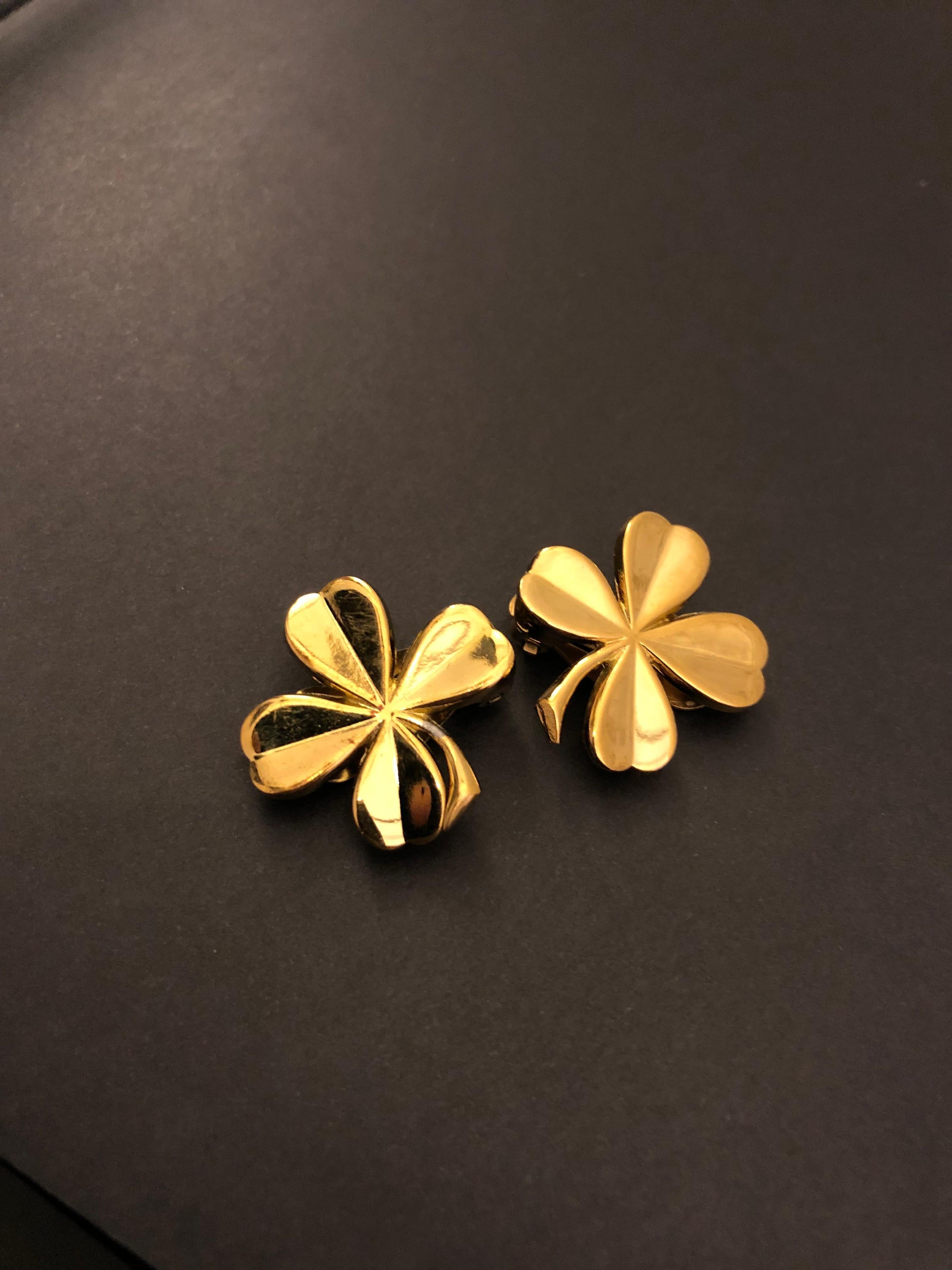 Vintage CHANEL gold toned clip-on earrings crafted in Chanel’s iconic clover leaf motif. Clover leaf represents good luck which was often used by CoCo Chanel in creating jewelry pieces. Stamped CHANEL 94A made in France. Width measures approximately