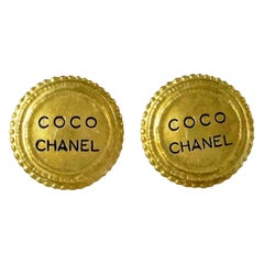 chanel gold black leather earrings