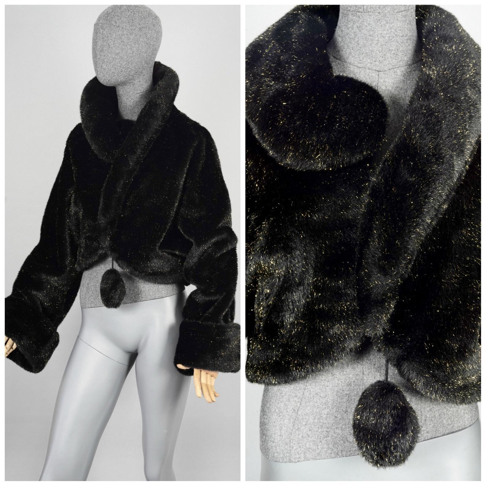 Vintage 1994 MOSCHINO Question Mark Shimmering Faux Fur Cropped Jacket

Measurements taken laid flat, please double bust and waist:
Raglan Sleeves: 30.31 inches  (77 cm)  from collar to cuff
Bust: 19.29 inches  (49 cm)
Waist: 17.71 inches  (45