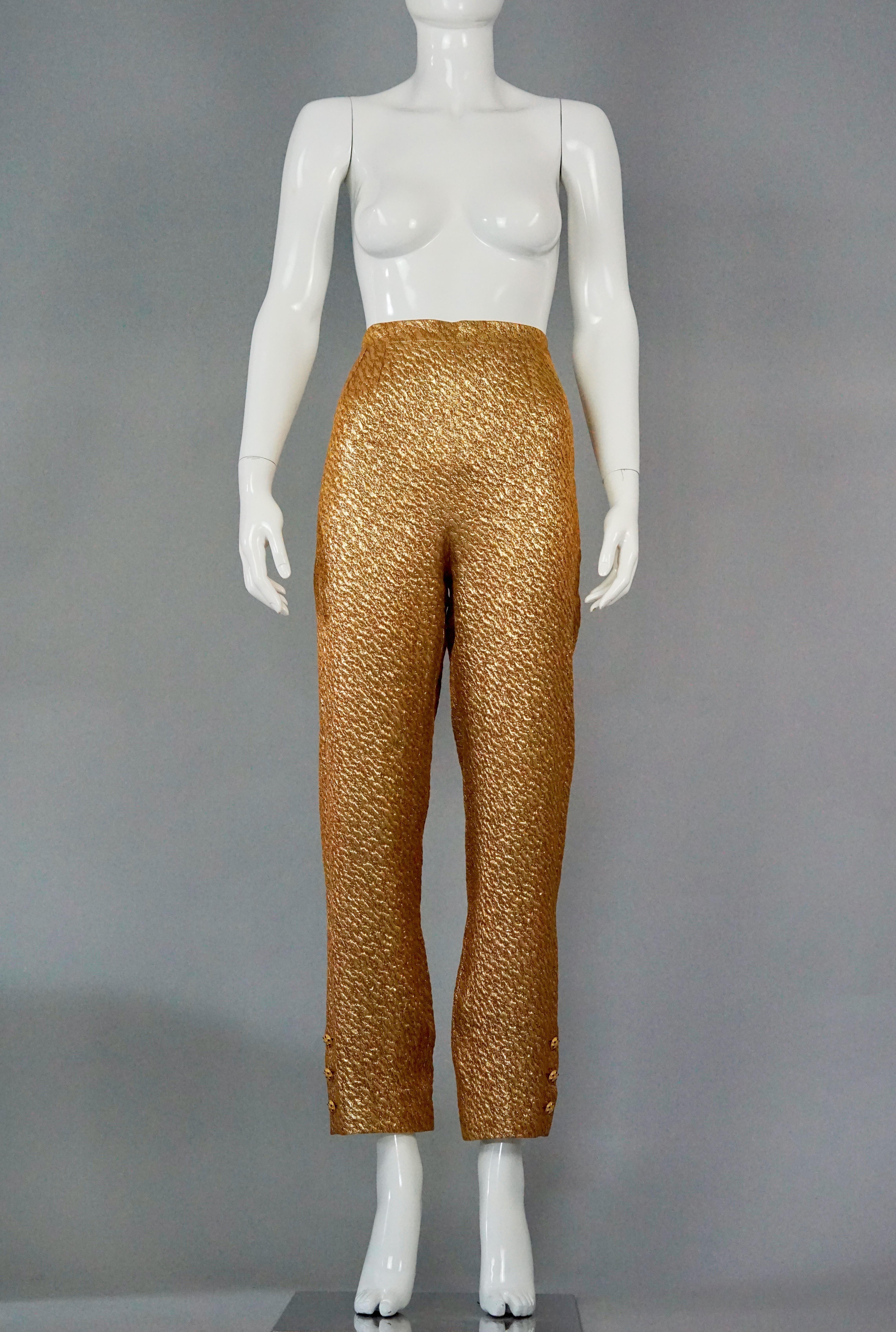 Vintage 1996 CHANEL Gold Brocade Silk Lurex with Gripoix Buttons Trouser Pants

Measurements taken laid flat, please double waist and hips:
Waist: 14.17 inches (36 cm)
Hips: 19.68 inches (50 cm)
Length: 40.15 inches (102 cm)

From 1996 Autumn