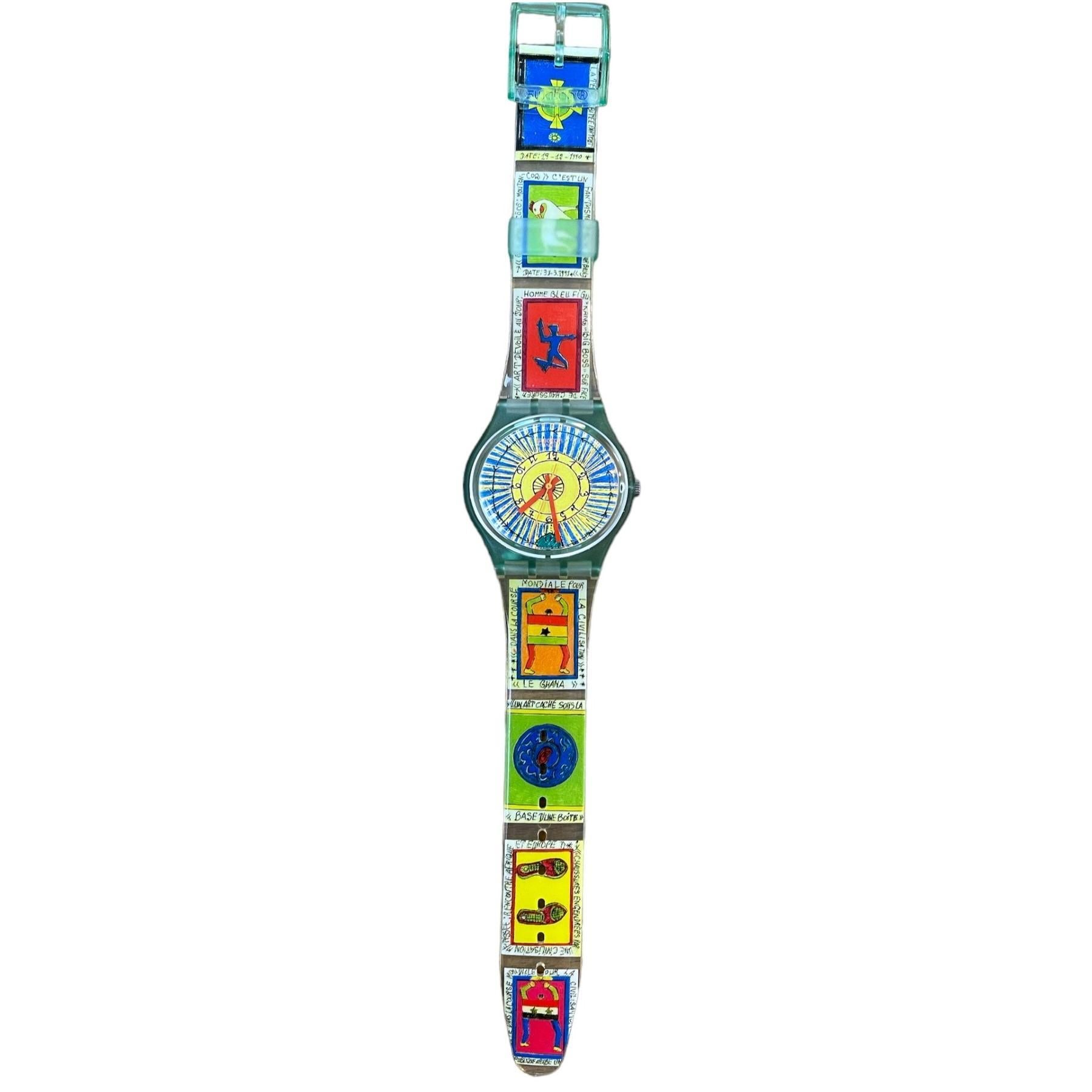 Discover the charm of this vintage Swatch watch, GG140 'CHEICK NADRO' designed by Frederic Bruly Boliabre in 1996. This timepiece is in very good condition, retaining its original strap.

Designer Piece: Designed by Frederic Bruly Boliabre, this