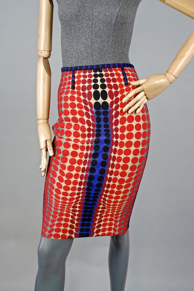 Vintage 1996 JEAN PAUL GAULTIER Cyberbaba Optic Illusion Skirt by Victor Vasarely

Measurements taken laid flat, please double waist and hips:
Waist: 12.99 inches (33 cm)
Hips: 17.12 inches (43.5 cm)
Length: 24.21 inches (61.5 cm)

From the