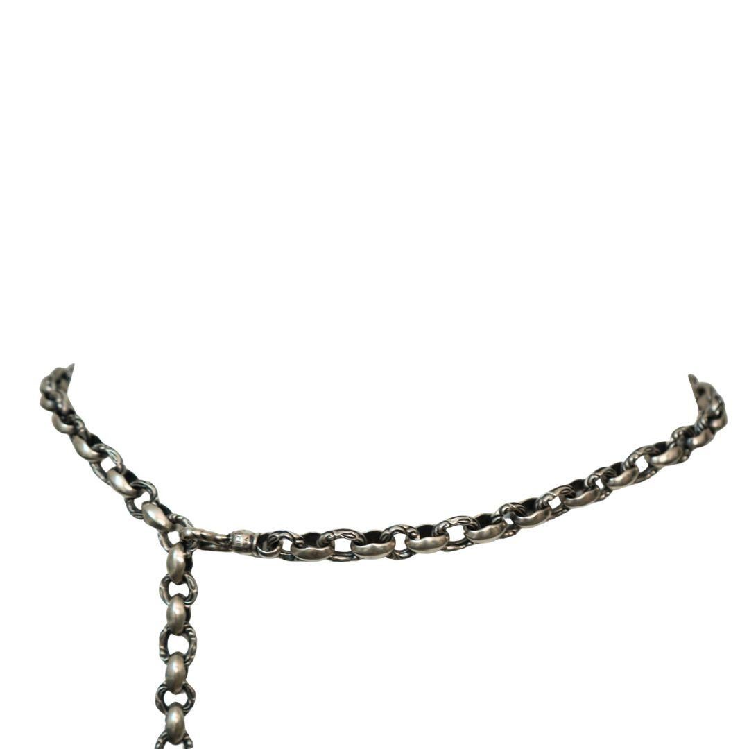 Cintura a catena in argento sterling vintage Leonard Kamhout. Questa cintura risale al 1996 circa e pesa 528,3 grammi di argento sterling. La cintura ha una lunghezza totale di 46 pollici e ha due campanelli d'argento appesi che hanno una lunghezza