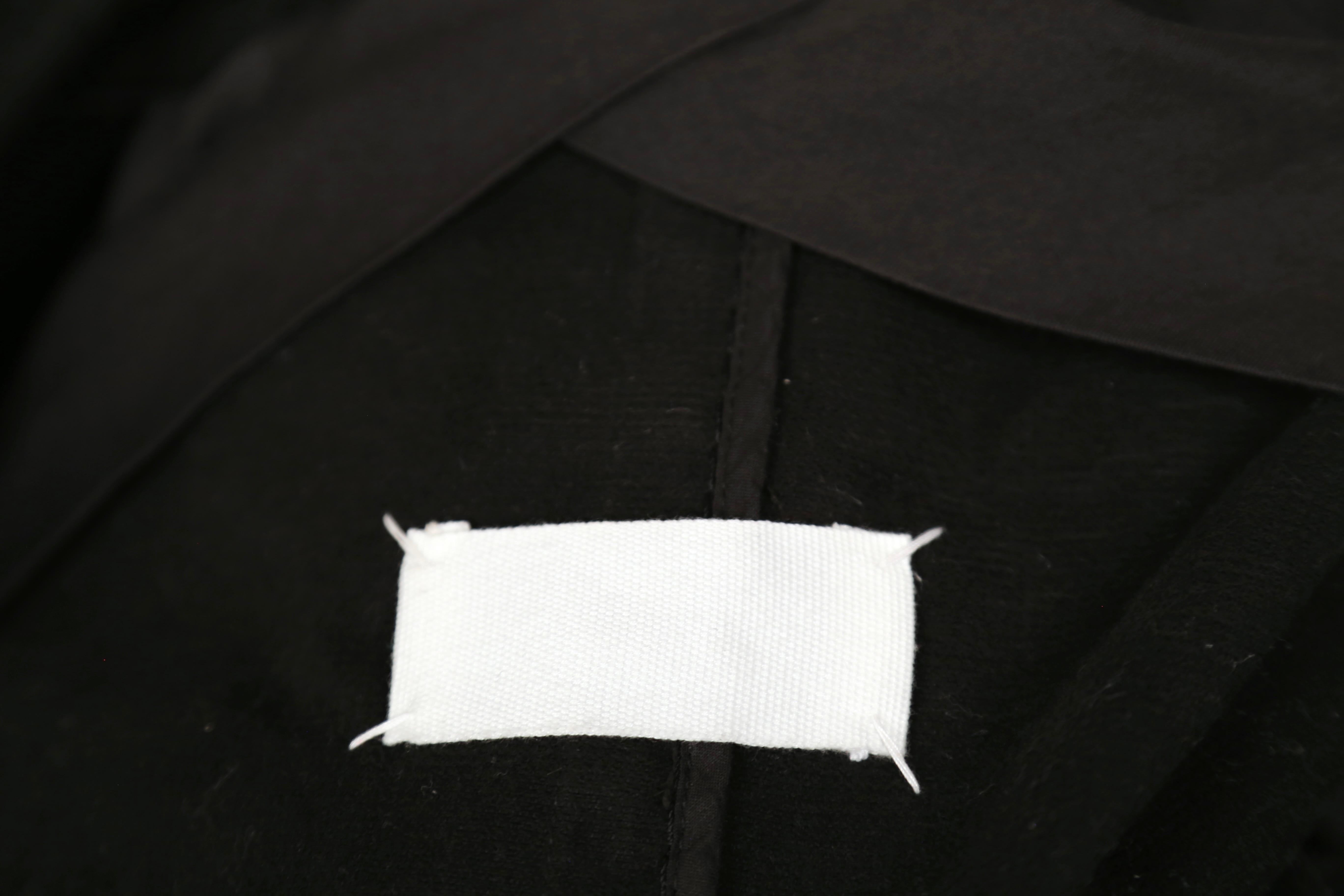 Vintage 1996 MARTIN MARGIELA black runway coat with 'elongated' pockets For Sale 2