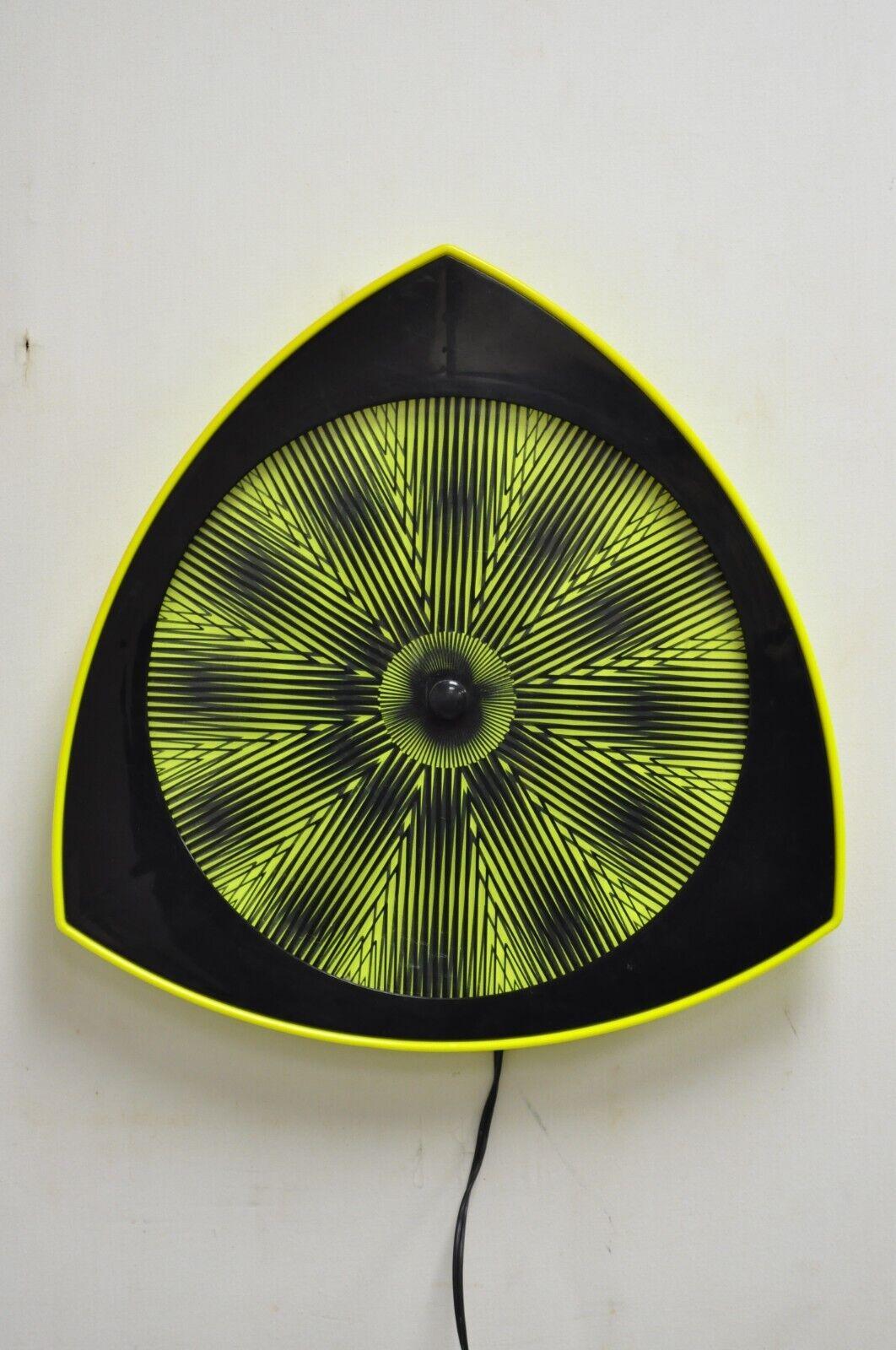 Vintage 1996 Rabbit Tanaka Lumaseries CyberSpace Neon Kinetic Wall Art (B). Item features a unique rotating form with changing optic geometric psychedelic patterns, original stamp, very nice vintage item. Circa Late 20th Century, 1996. Measurements: