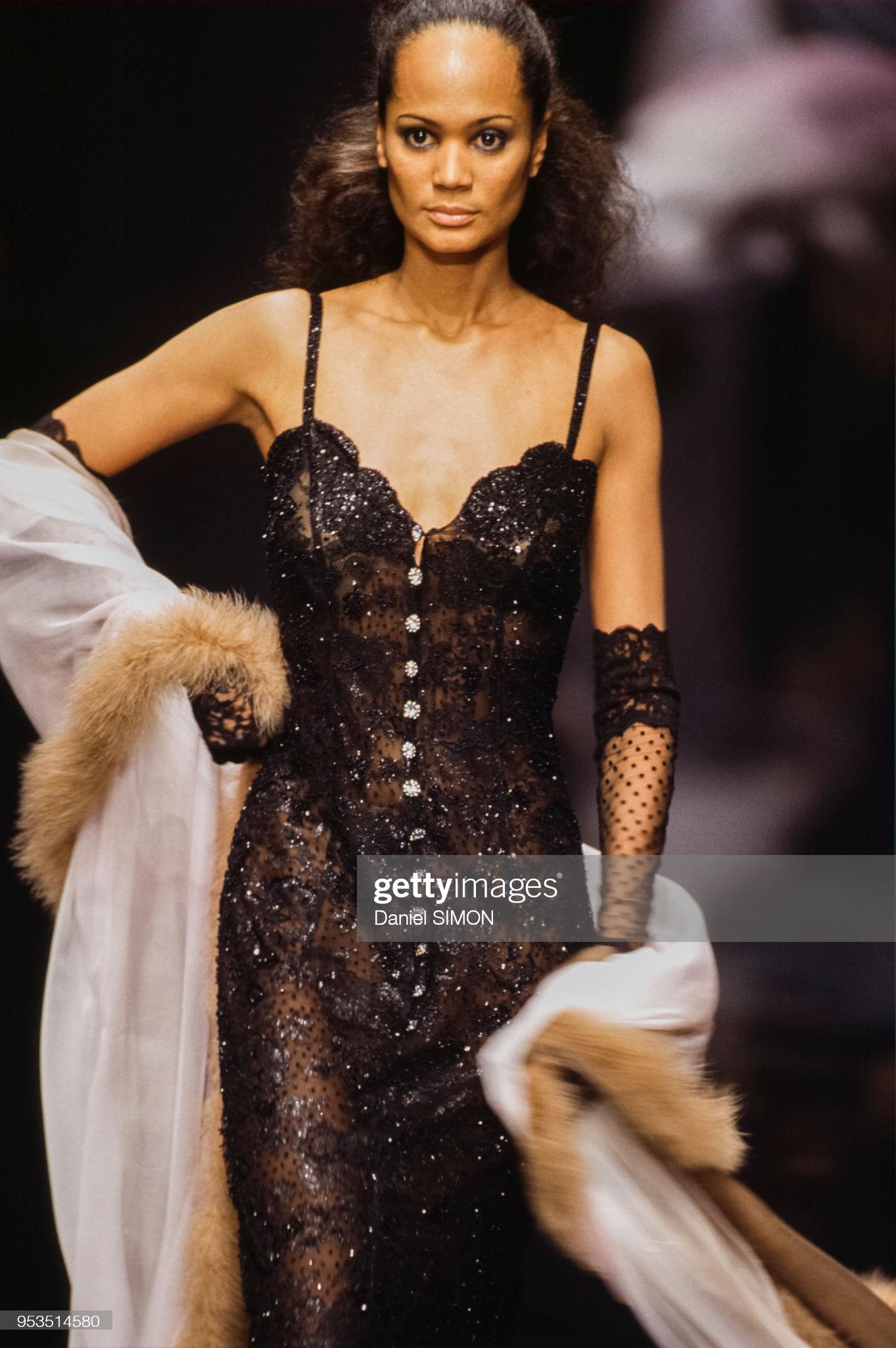 Stunning Ungaro haute couture red lace gown ensemble dating back to his 1995-96 fall/winter runway collection. Ungaro, who trained under Spanish designer Cristobal Balenciaga, described himself as a 