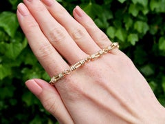 Collana e bracciale in oro giallo vintage 1996 di UnoAErre