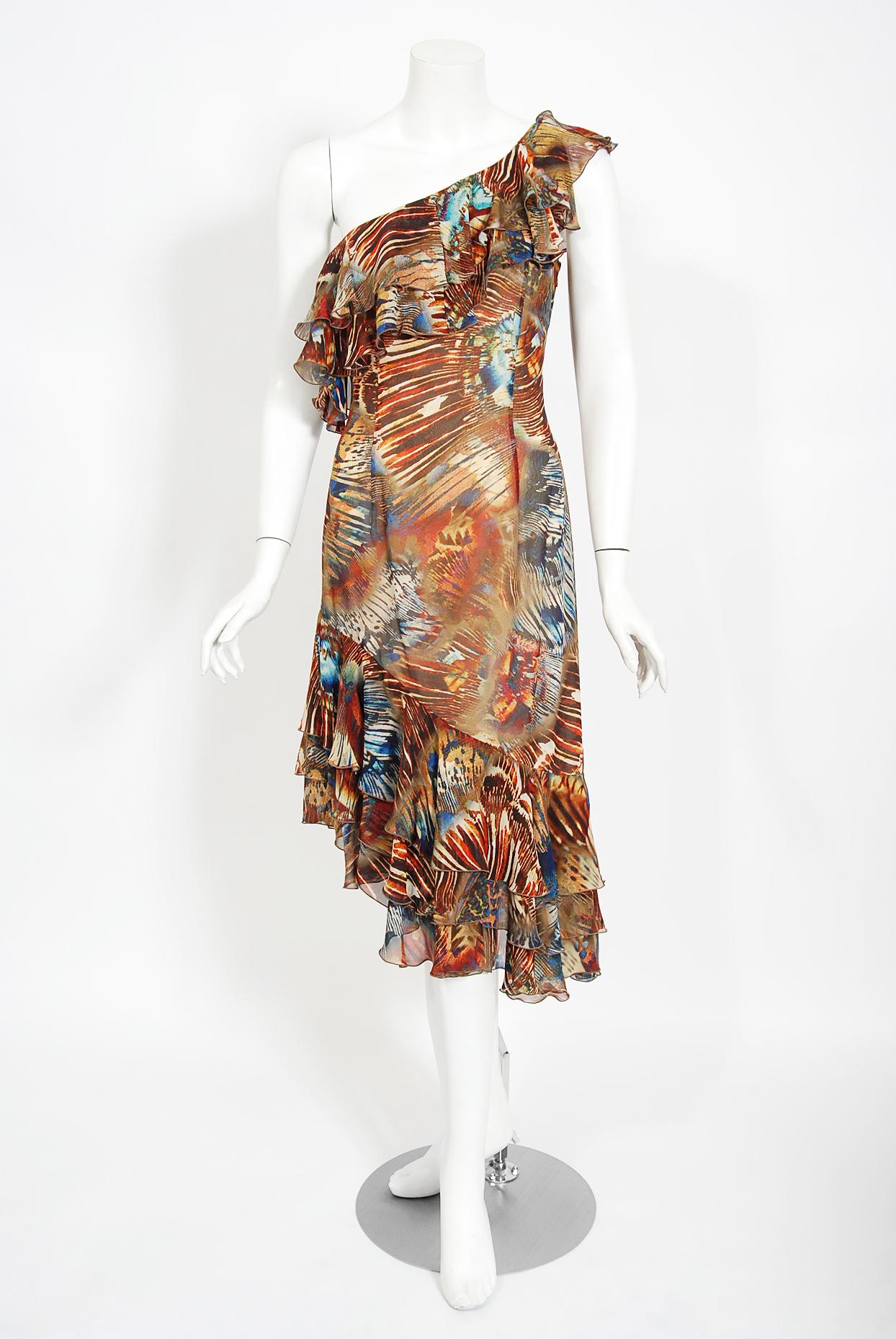This sensational butterfly-wings insect novelty print silk dress from his 1997 spring-summer couture collection is a perfect example of Thierry Mugler's genius. He is known for bold fashion and edgy, sometimes even campy, theatricality. In the