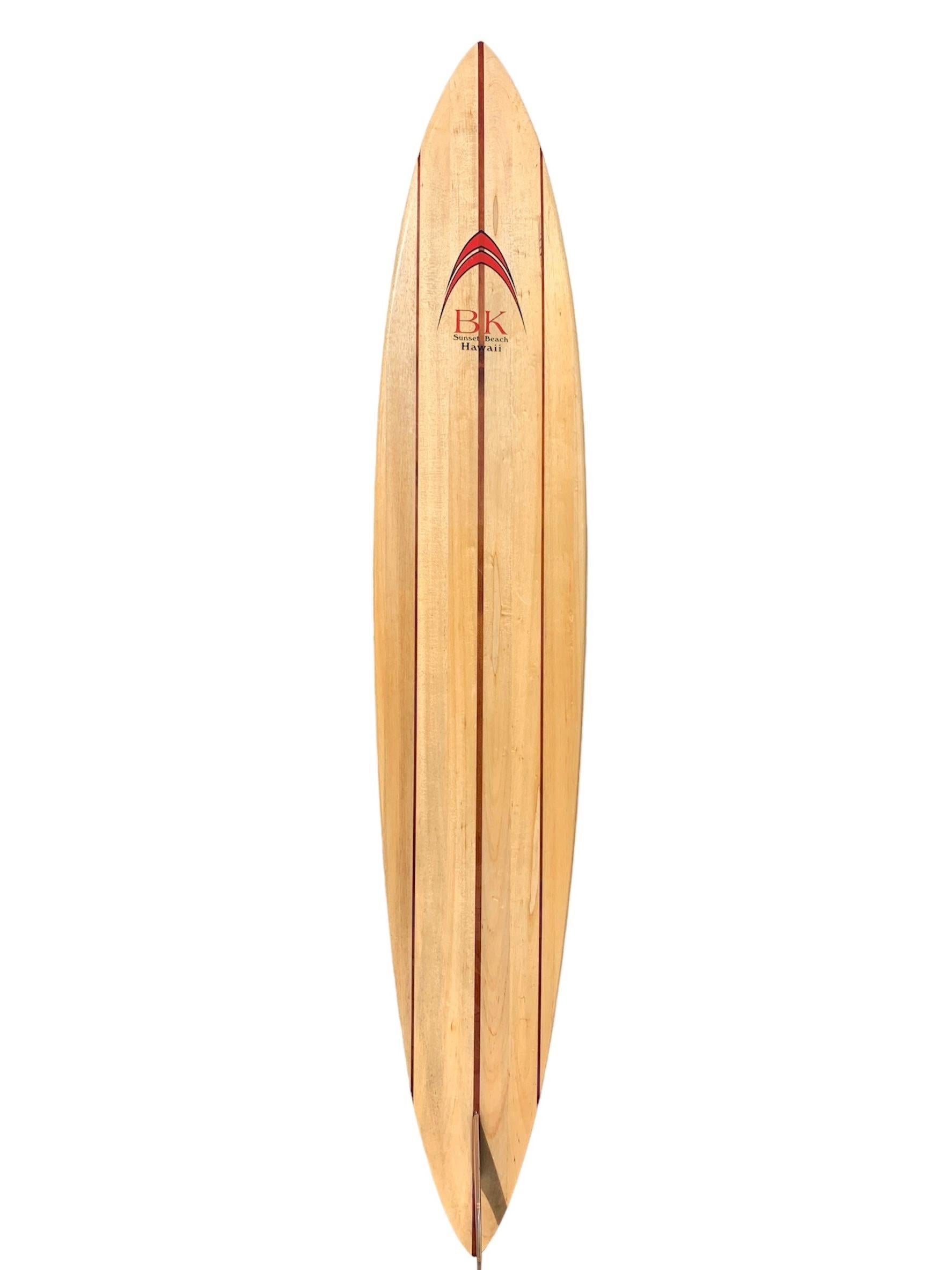 1998 Vintage Barry Kanaiaupuni balsawood pintail surfboard. Features big wave shape-design with triple redwood stringers and remarkable 17 piece wood fin. An amazing example of a big wave balsa surfboard shaped by the renowned Hawaiian surfer, Barry