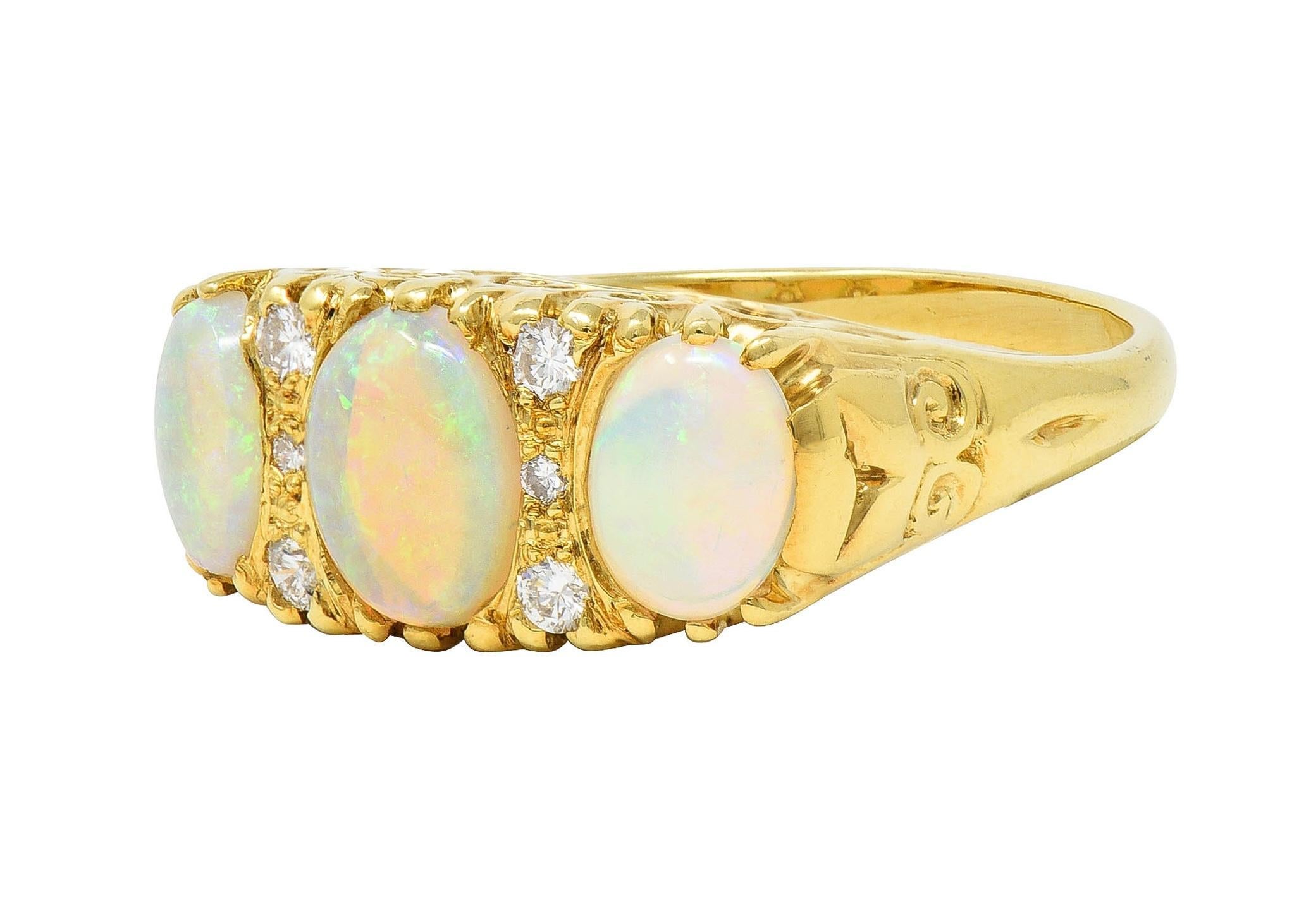 Vintage 1998 Opal Diamond 18 Karat Gold Scrolling Three Stone Ring For Sale 1