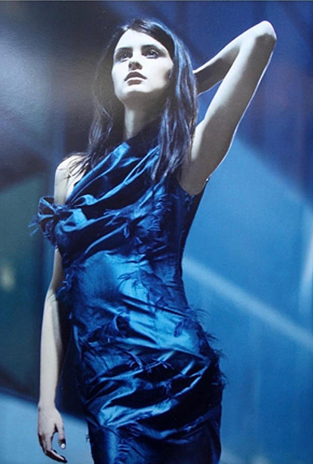 A well documented and totally timeless Christian Dior sapphire blue eyelash silk bias-cut gown from John Galliano's iconic 1999 fall-winter collection. John Galliano is widely considered one of the most innovative and influential fashion designers