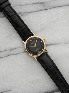 Rolex Lady Cellini 6110 vintage del 1999, oro giallo 18 carati, quadrante nero "bullseye", movimento al quarzo, 25 mm
