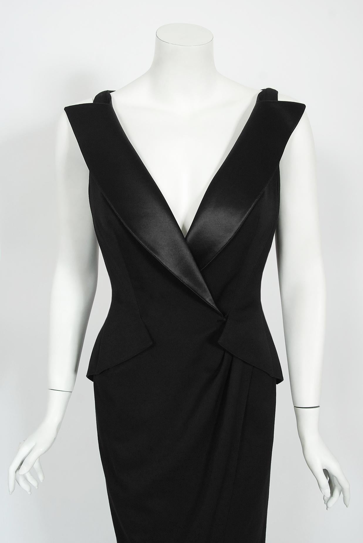 An iconic and totally timeless Thierry Mugler couture fall winter 1999-2000 black bustier hourglass tuxedo gown with original store tags still attached. This legendary French fashion designer is known for bold fashion and edgy, sometimes even campy,