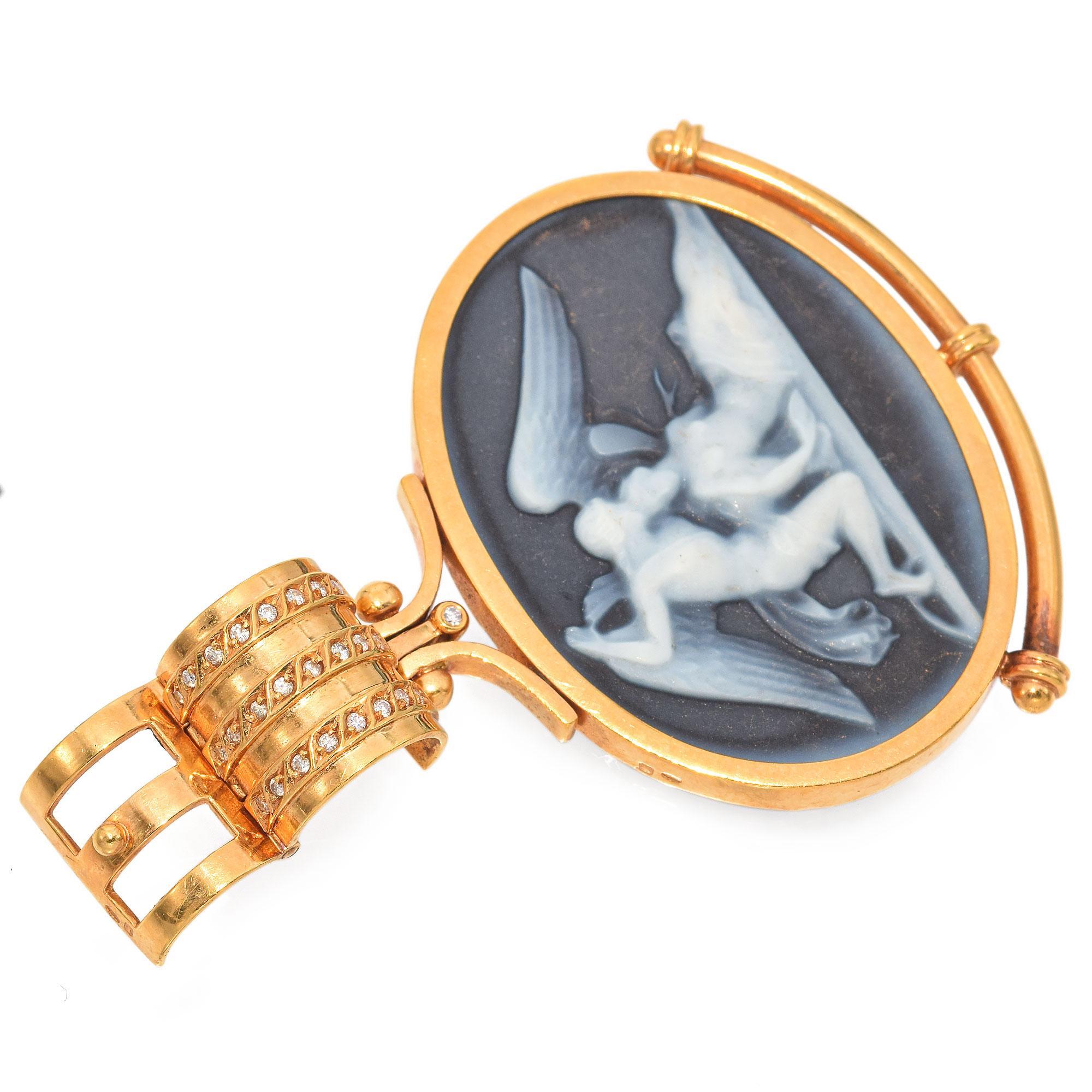 This exquisite pendant features a cameo carved from blue agate, depicting the mythological scene of Cupid and Psyche in a moment of tender connection. The design is inspired by a marble relief created in 1810 by the renowned neoclassical sculptor