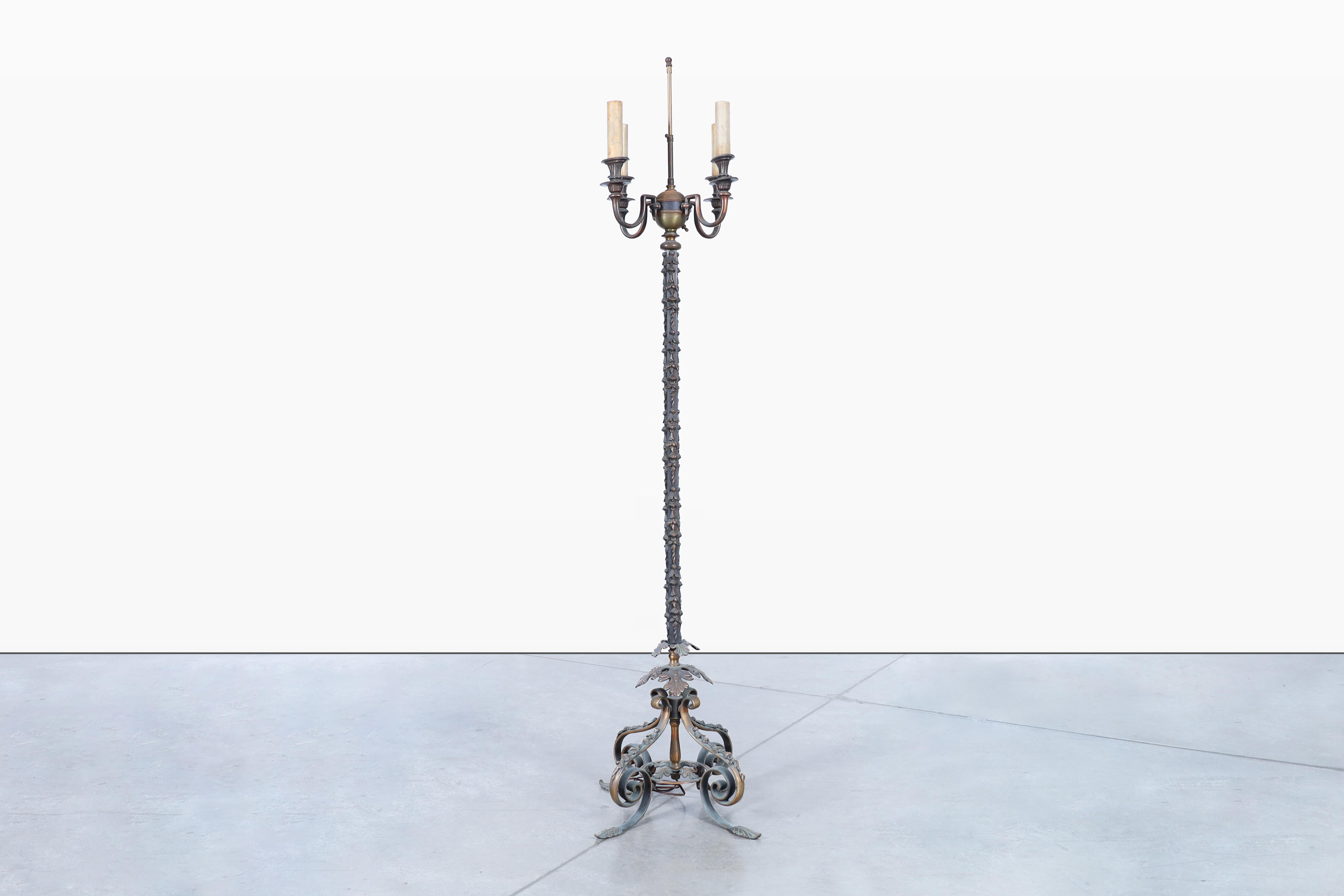 Stunning vintage 19th century bronze floor lamp designed in France. This exquisite lamp is a true masterpiece, crafted from bronze and emanating antique vibes in every inch of its design. The pole showcases intricate detailing, adding a touch of