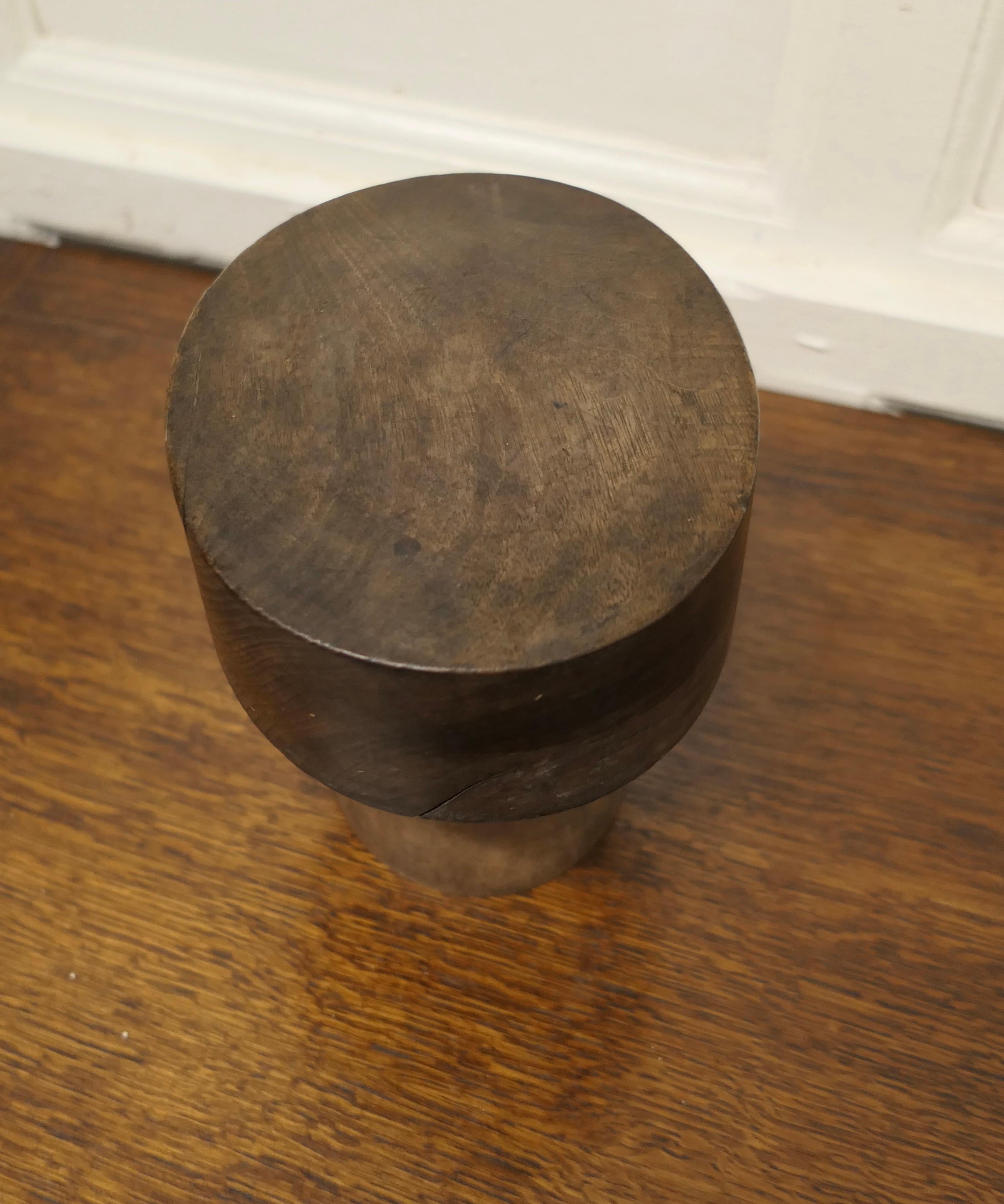 Vintage 19th century French hat block, shop display

This is one of a collection of milliners hat forms, they come from Lyon and date from before 1900

This block is made in fruitwood, the shape an oval pill box and it is on a stand 
The hat on