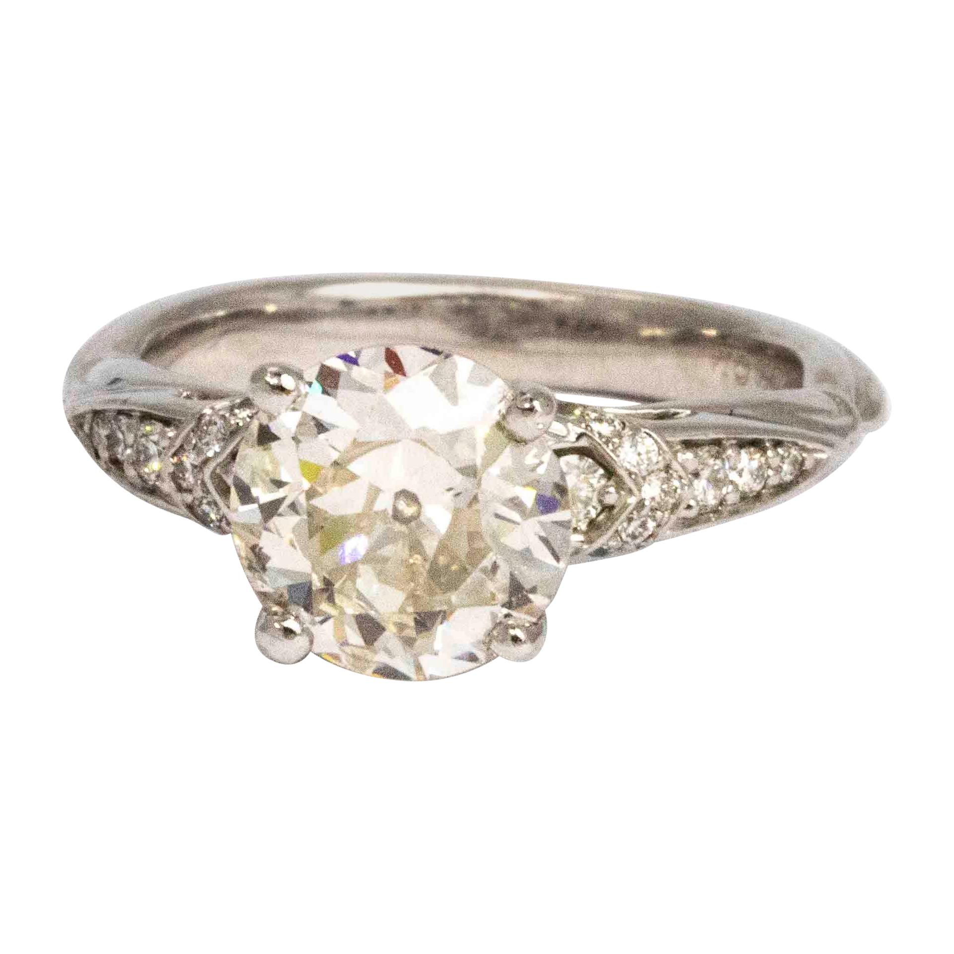 Vintage 2 Carat Diamond and Platinum Solitaire with Diamond Shoulders