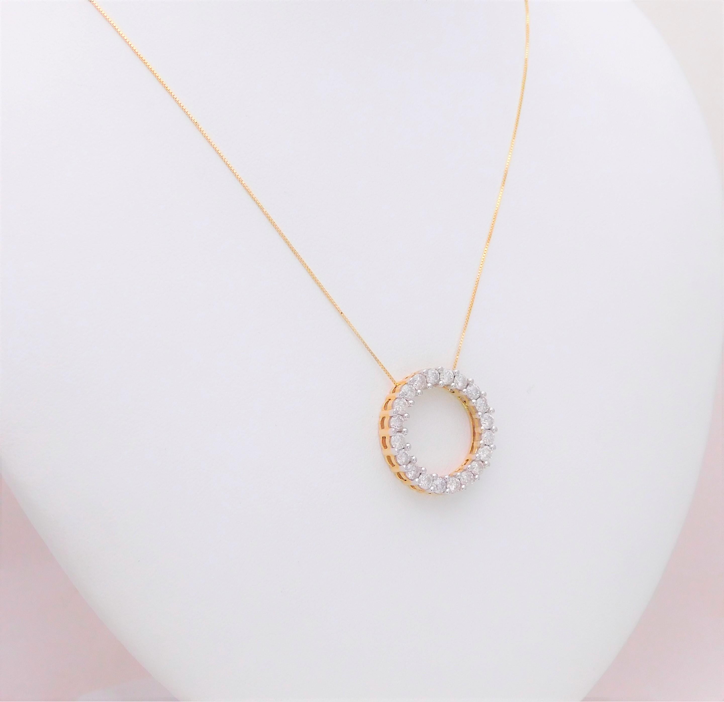 From a charming Southern estate.  This dazzling sliding pendant-style necklace has been crafted in solid 14k yellow gold.  It has been set, in a double shared prong setting, with a total of 20 natural round brilliant-cut diamonds approximating 2ct