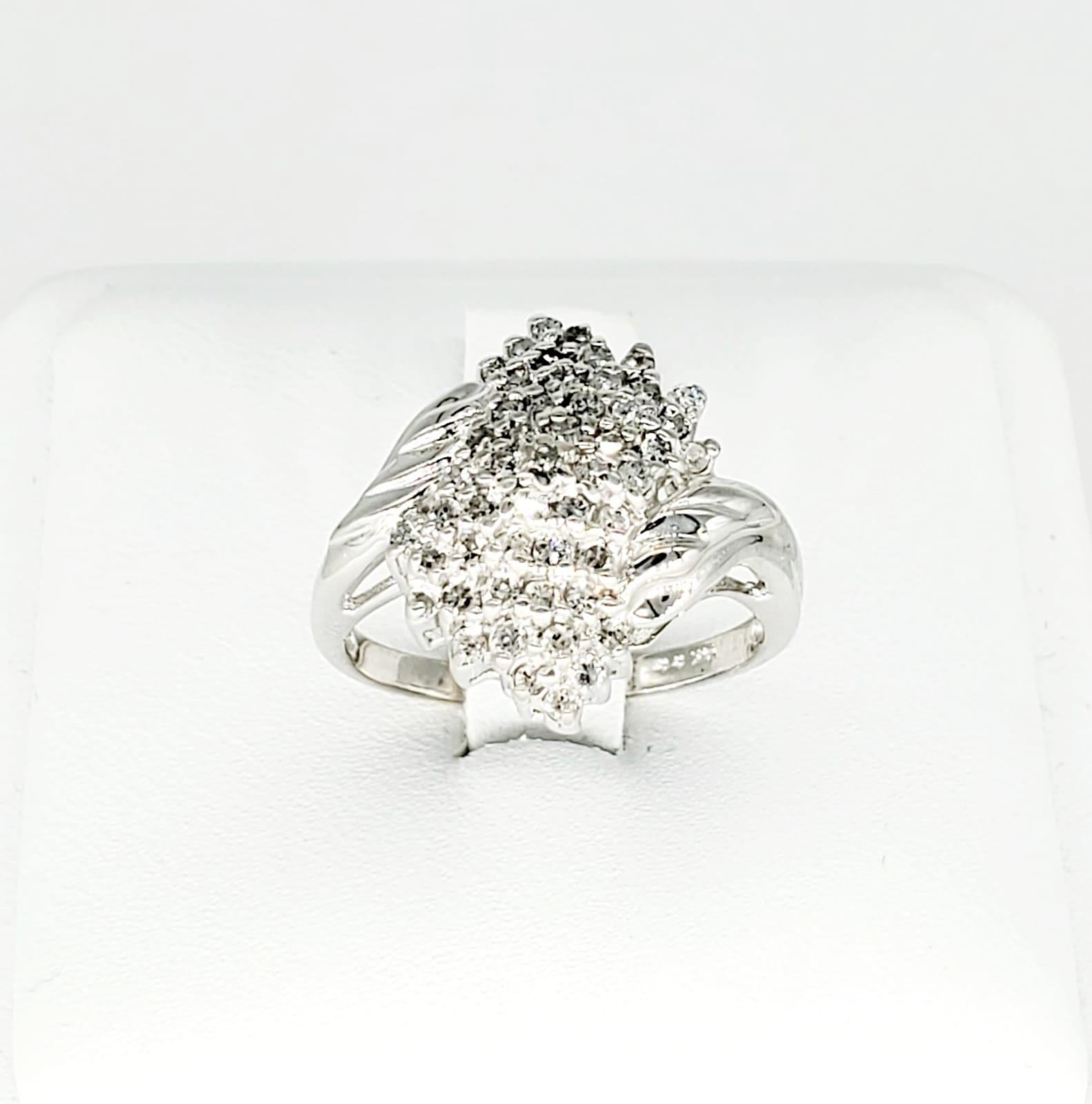 Vintage 2 Carat Diamonds Cluster Ring 14k White Gold. The ring is a size 6 and weights approx 4.8 grams.