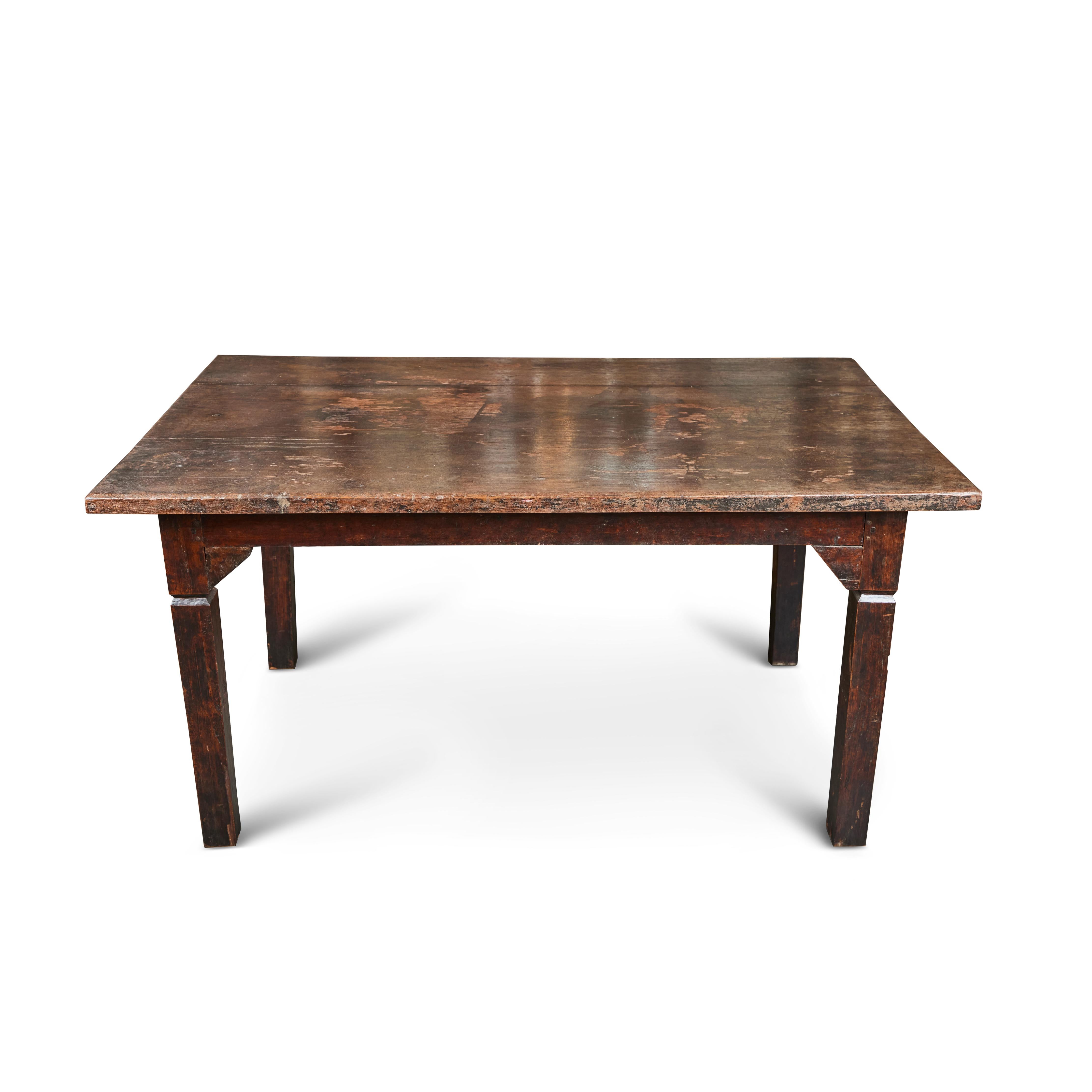 Sturdy in construction this vintage 2-plank top solid Teak wood table from Burma is the perfect centerpiece. It is generous in size with simple lines and beautiful original finish. Great for a dining table or a desk / library table.

60