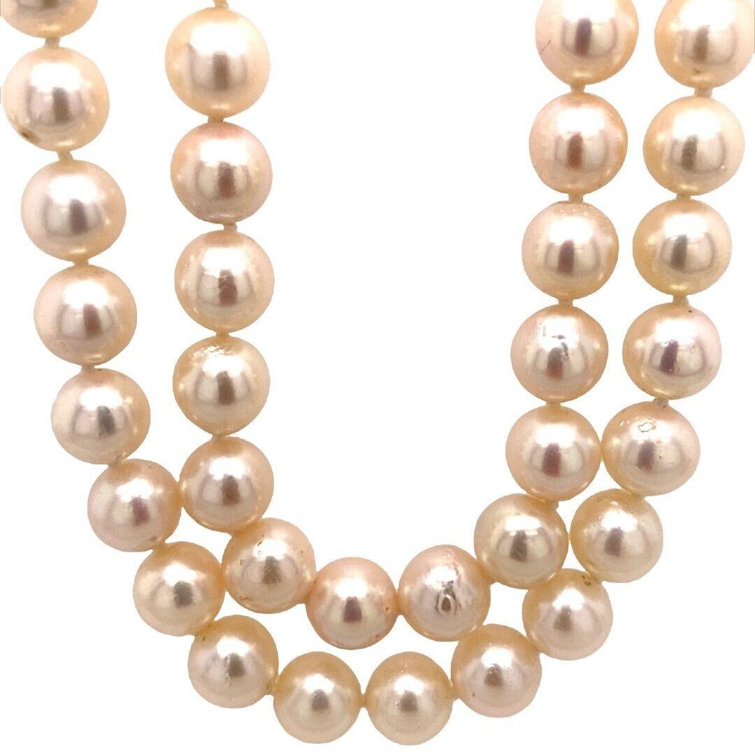 Taille ronde Collier vintage à 2 rangées de perles de culture serties dans un fermoir en or 18 carats avec diamants en vente