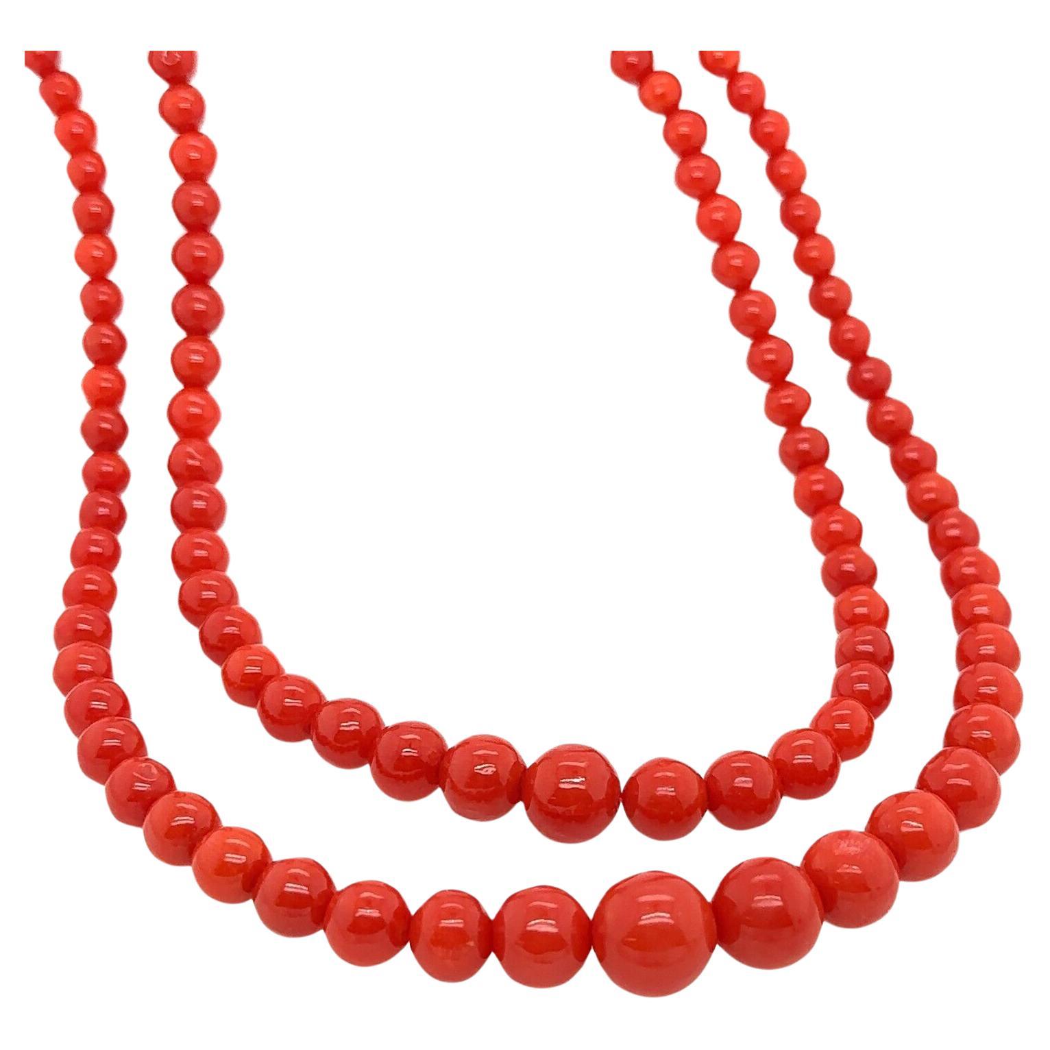 This unique necklace features a 14ct Gold clasp that adds a touch of opulence and luxury, perfectly complementing the warmth and charm of the magnificent red Coral. The undeniable vintage appeal of this remarkable necklace adds an air of