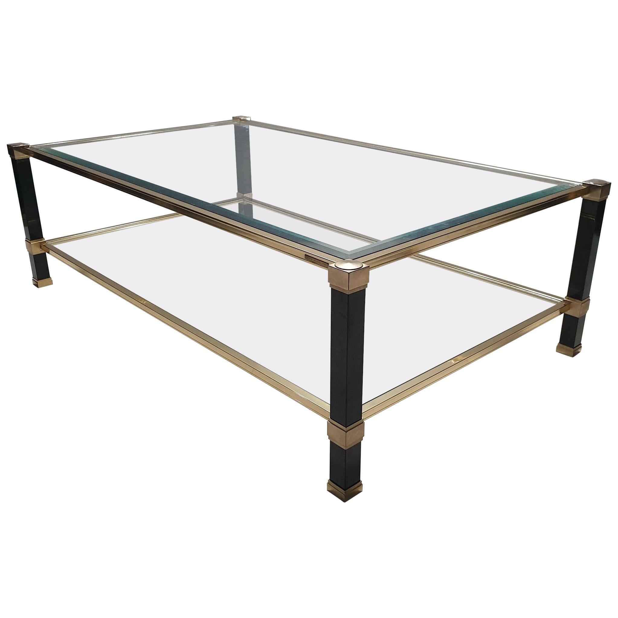 Vintage 2-tiers brass coffee table by Pierre Vandel, 1980s For Sale