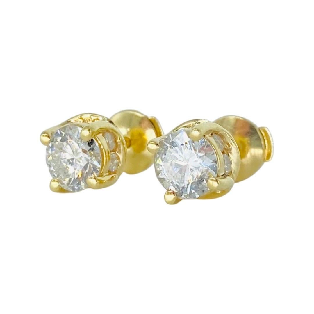 Vintage 2.00 Carat Total Diamonds Stud Earrings Patented Backing 14k. The diamonds color are H/I & clarity are SI2-SI3 very nice pair of studs. The center diamond each weight approx 0.76 carat and surrounding diamonds 16 stones X 0.03ct = 0.48 carat