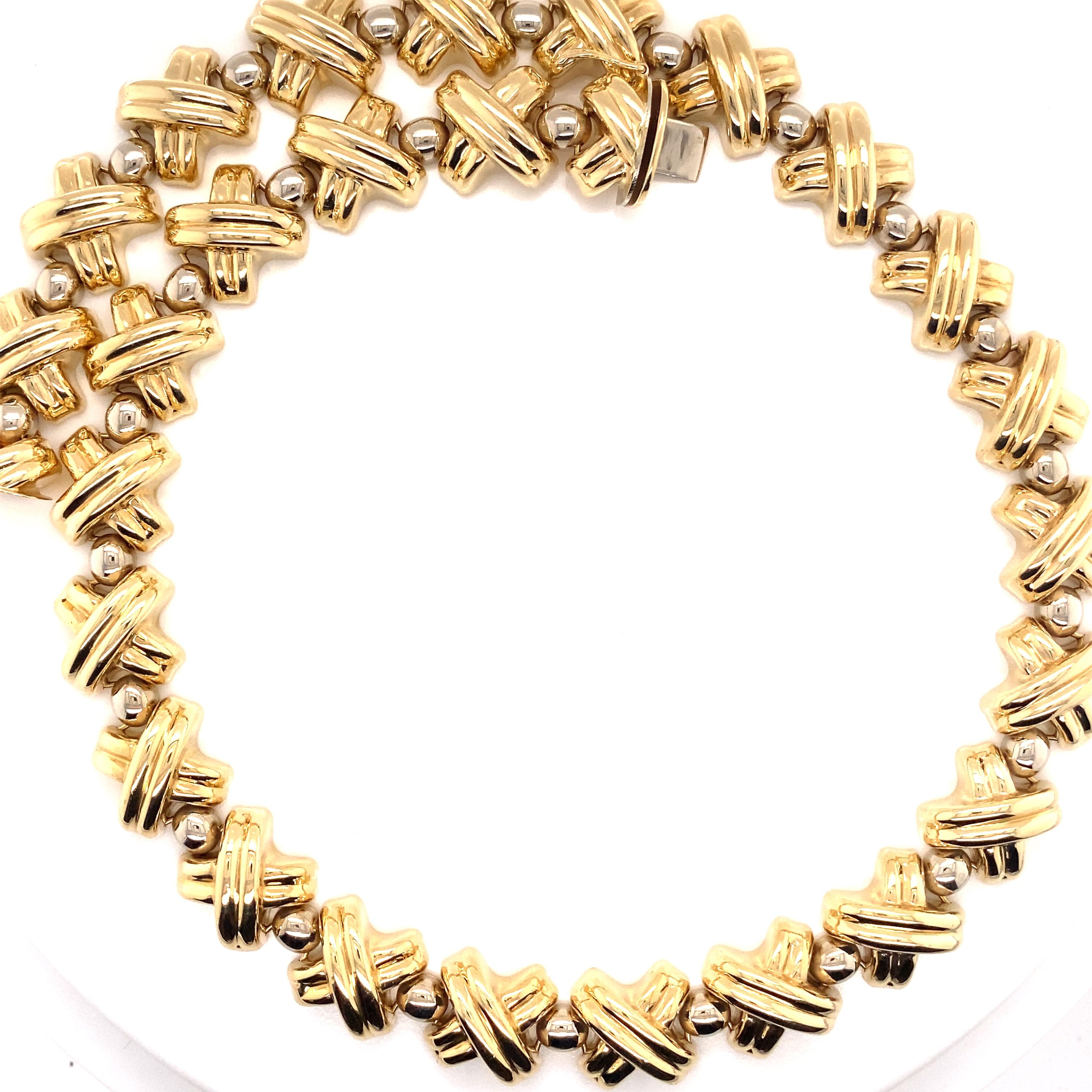 X and o gold necklace