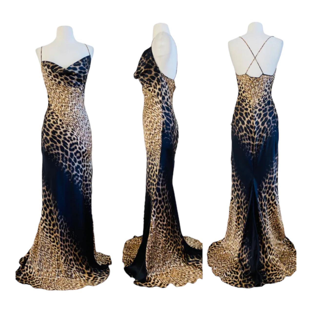 2000 Roberto Cavalli Silk Dress Gown
Similar style seen on Cindy Crawford
Incredible leopard print with contrasting black asymmetrical stripes silk fabric
Lightly draped neckline
Thin shoulder straps that cross at the upper back
Bias cut maxi