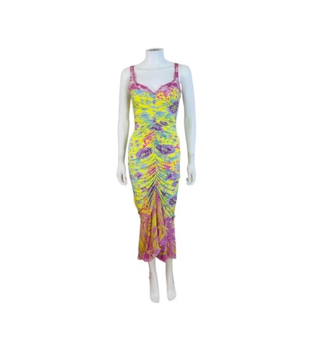 Vintage 2000s Emanuel Ungaro Dress
Floral print viscose + spandex fabric with lace trim on the bust + sleeves, semi sheer contrasting chiffon fabric at the hem
Sleeveless
Fitted bodycon style
Ruched detail up the front
Midi length
Lined at bust