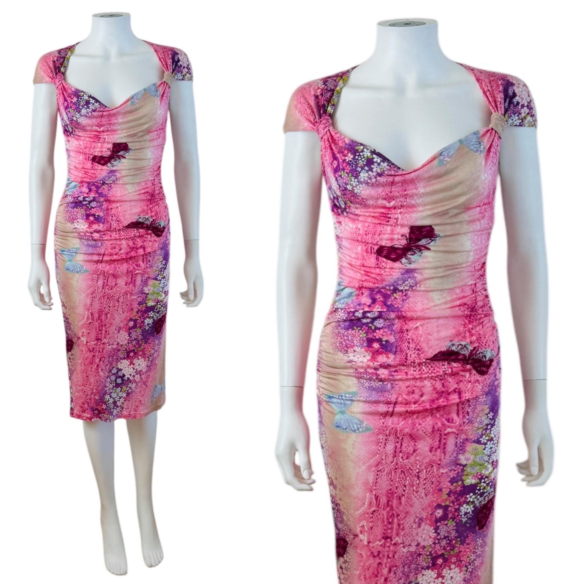 Vintage 2000s Emanuel Ungaro Dress
Snake, floral + butterfly print rayon fabric
Short capped sleeves
Draped weighted neckline
Fitted bodycon style
Ruched details on both sides
Midi length
Unlined
Hidden zipper up the left side

Marked 36, Fits like