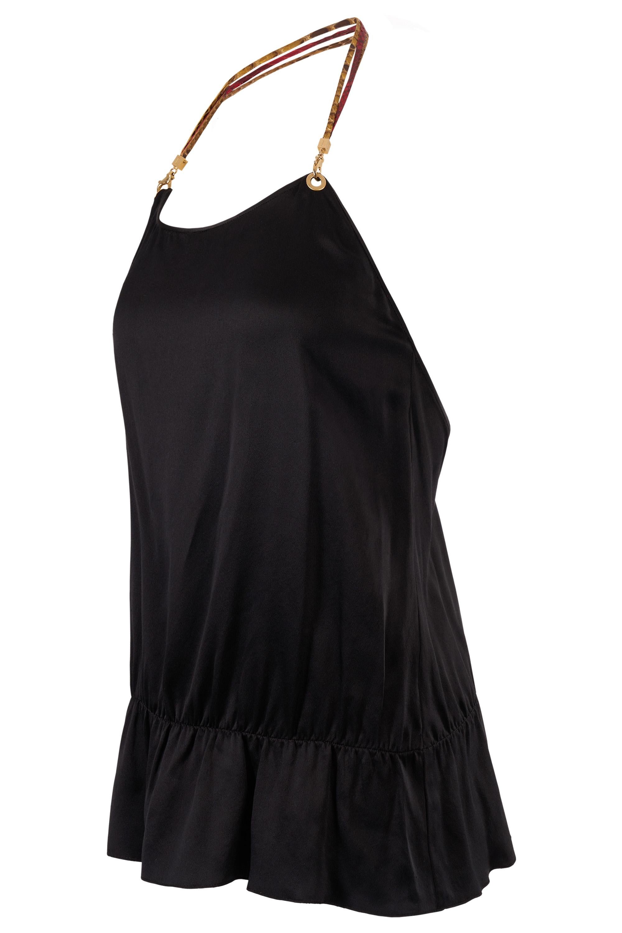Vintage Iceberg black silk top. Feature a light silk fabric, round neckline, open back, ruched at the hem and removable halter straps in python.  In excellent vintage condition. 

Brand: Iceberg
Default Title
Size: UK 8
Color: Black
Tag Size: