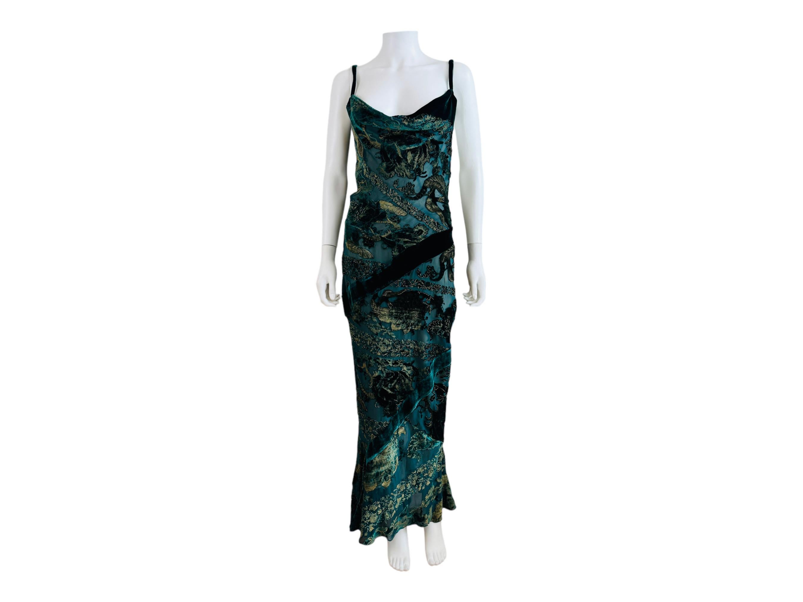 Early 2000s Roberto Cavalli Dress
Silk + viscose green + gold velvet fabric
Floral burnout print throughout
Draped neckline
Fitted bias style
Thin shoulder straps
Open very low cut back with draped details
Hidden zipper up the side with gold logo