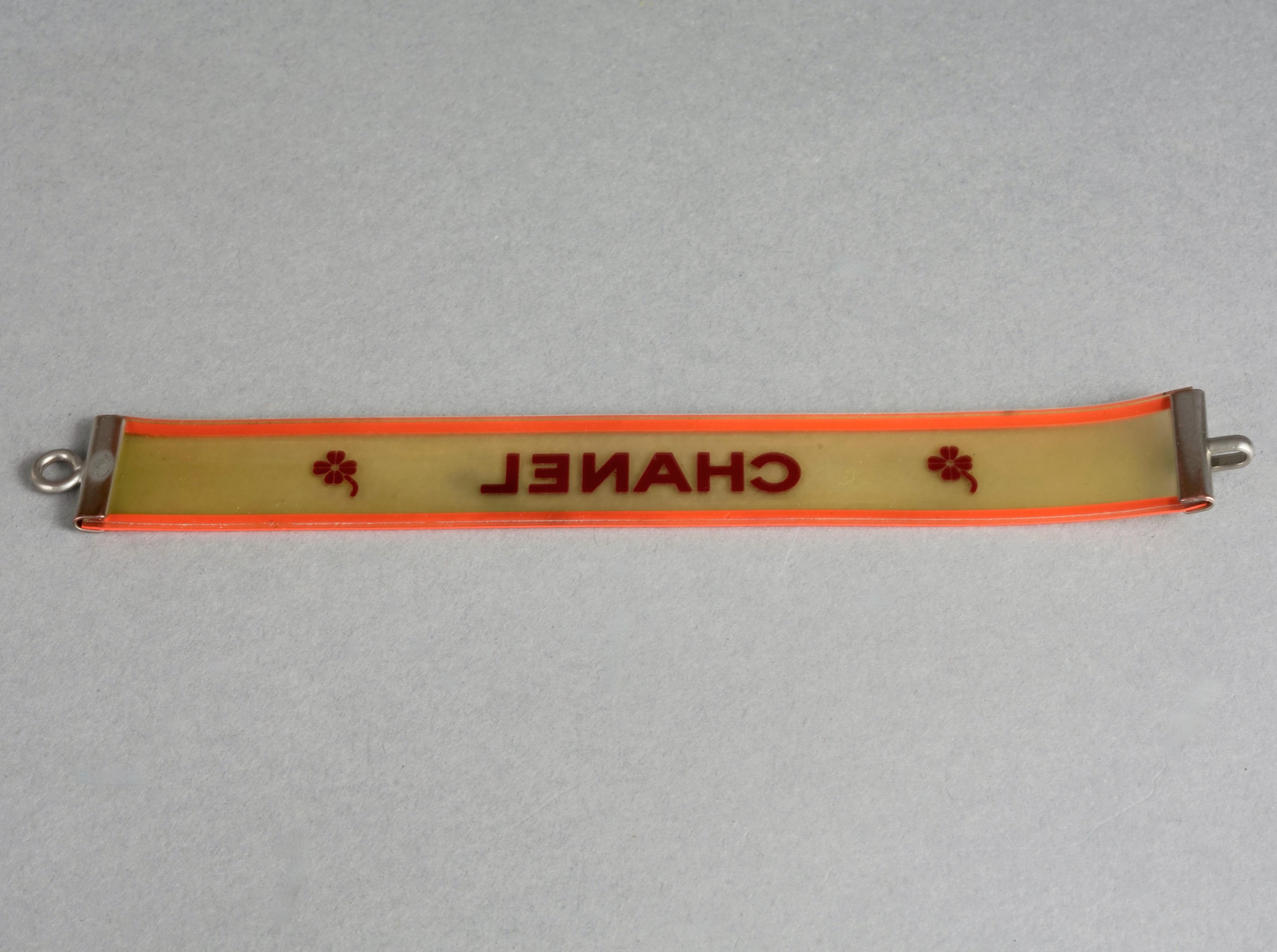 Vintage 2001 CHANEL Logo Camellia Orange Violet Rubber Cuff Bracelet For Sale 1