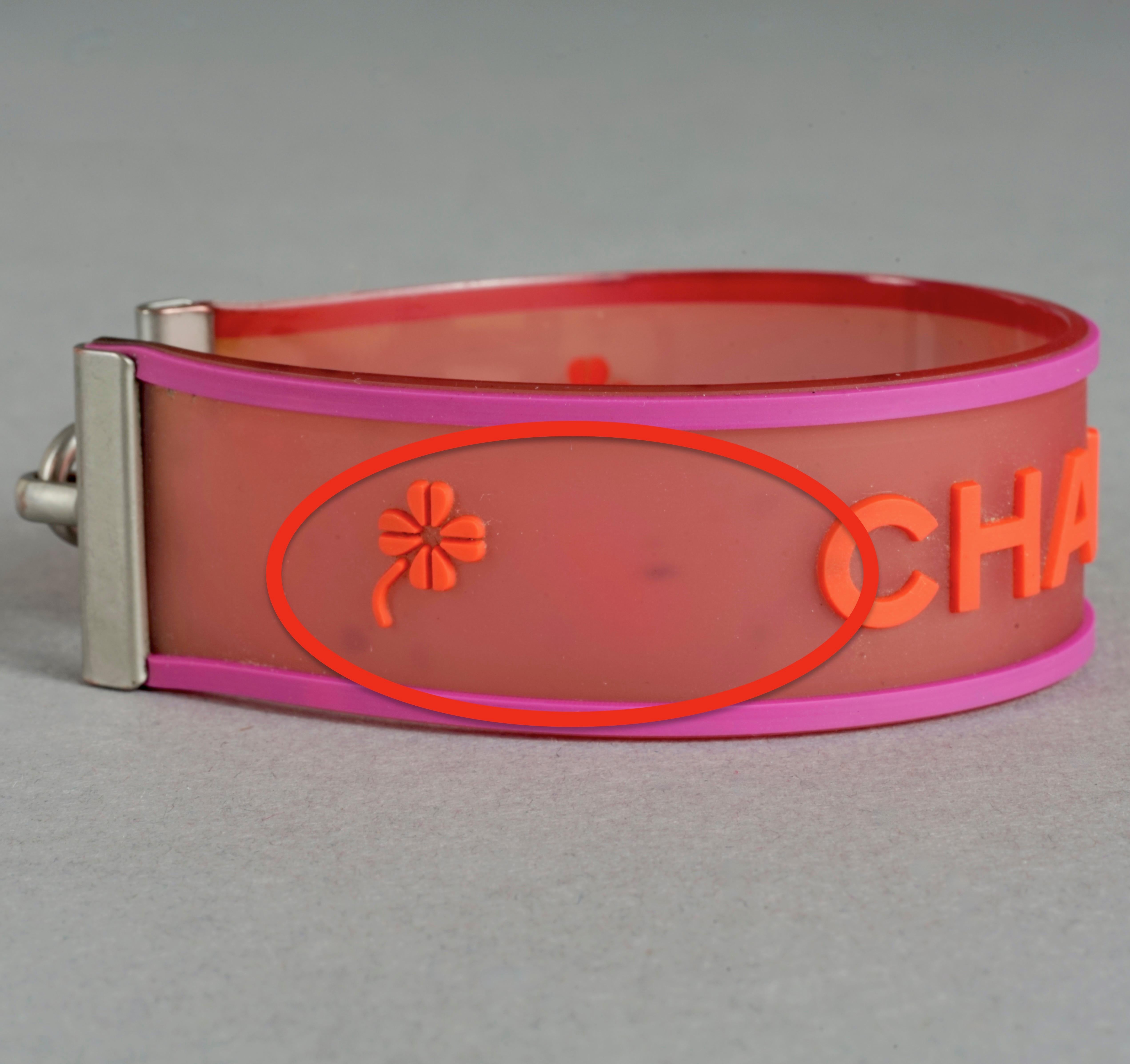 Vintage 2001 CHANEL Logo Camellia Pink Orange Rubber Cuff Bracelet For Sale 3