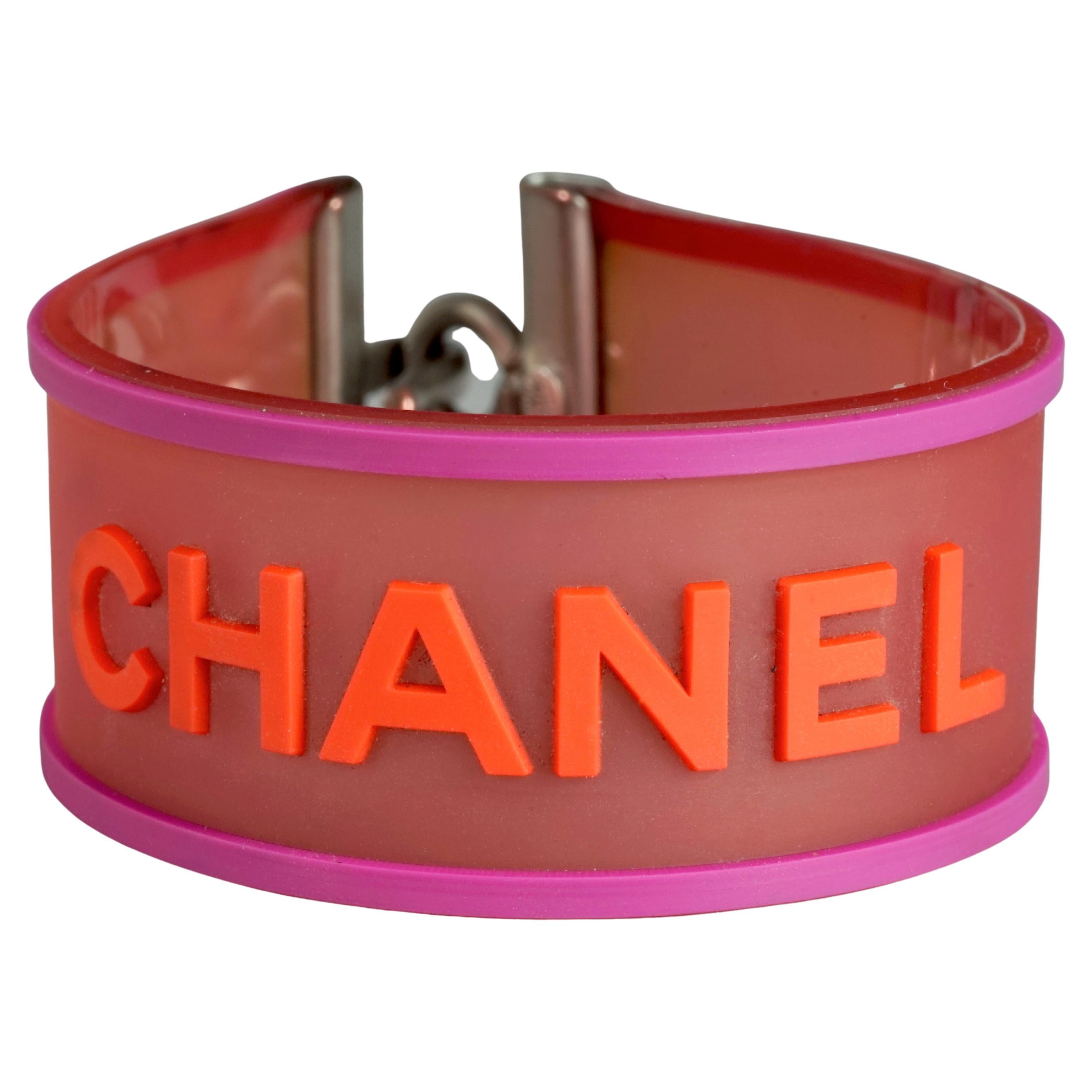 Vintage 2001 CHANEL Logo Camellia Pink Orange Rubber Cuff Bracelet For Sale