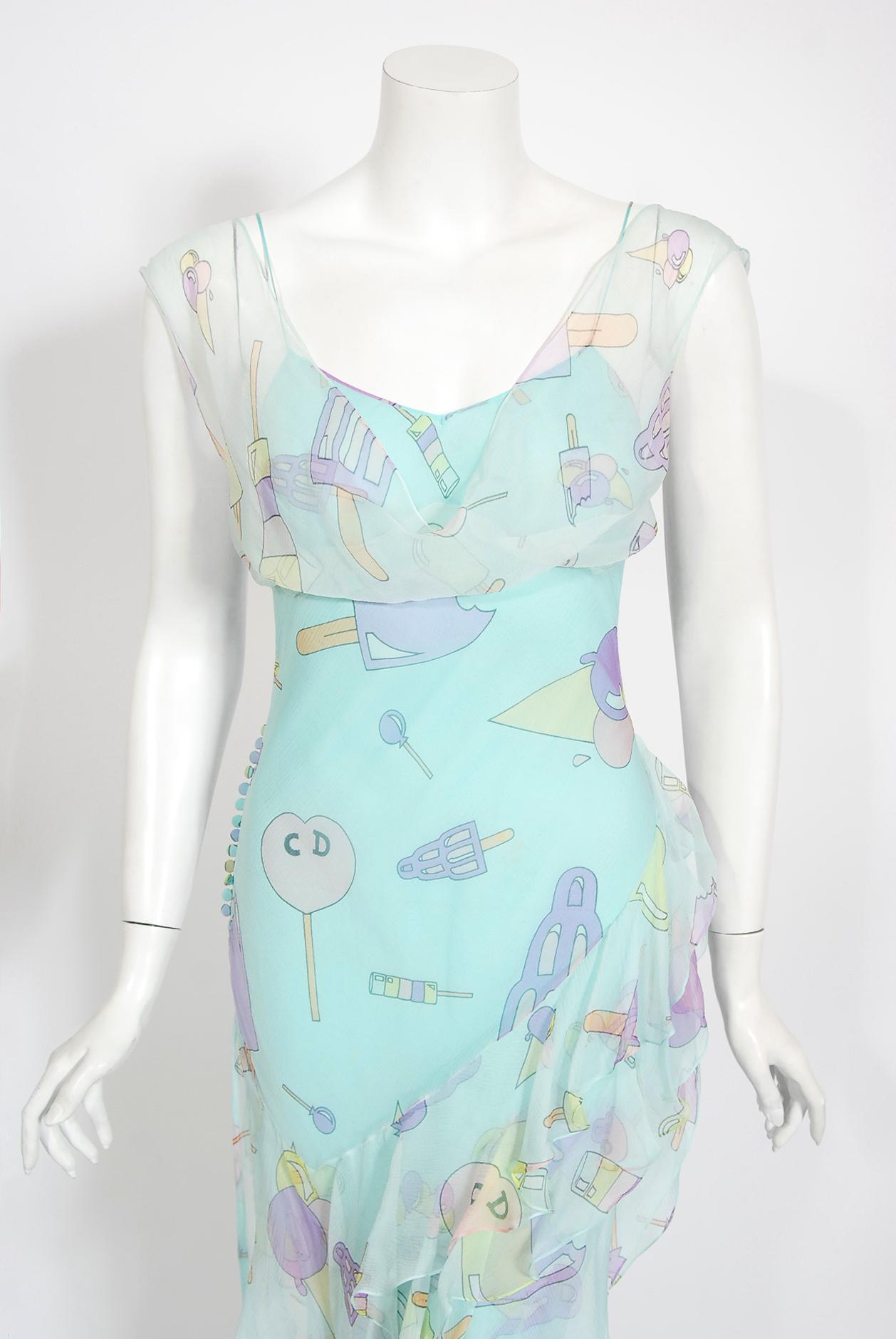 A simply stunning and whimsical Christian Dior candy and ice cream novelty logo print sheer silk bias-cut gown. This rare Christian Dior treasure from John Galliano's celebrated 2002 spring-summer collection is a perfect example of his genius. Vogue