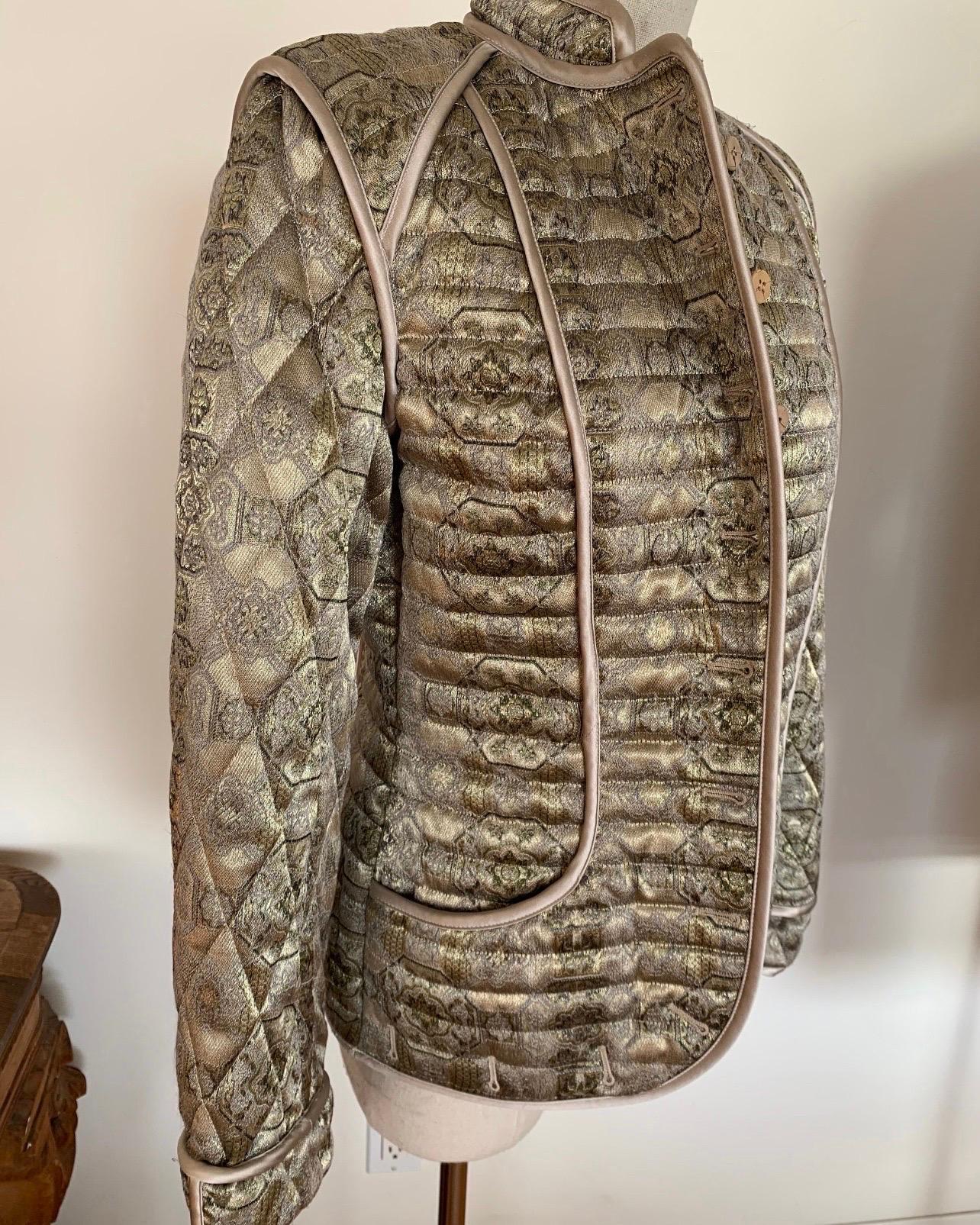 Get ready to have everyone ask you where you found this Iconic jacket!!
Vintage ALEXANDER MCQUEEN. It is a total show stopper!

Alexander Mcqueen green, taupe and gold metallic quilted brocade jacket as seen on the 2003 