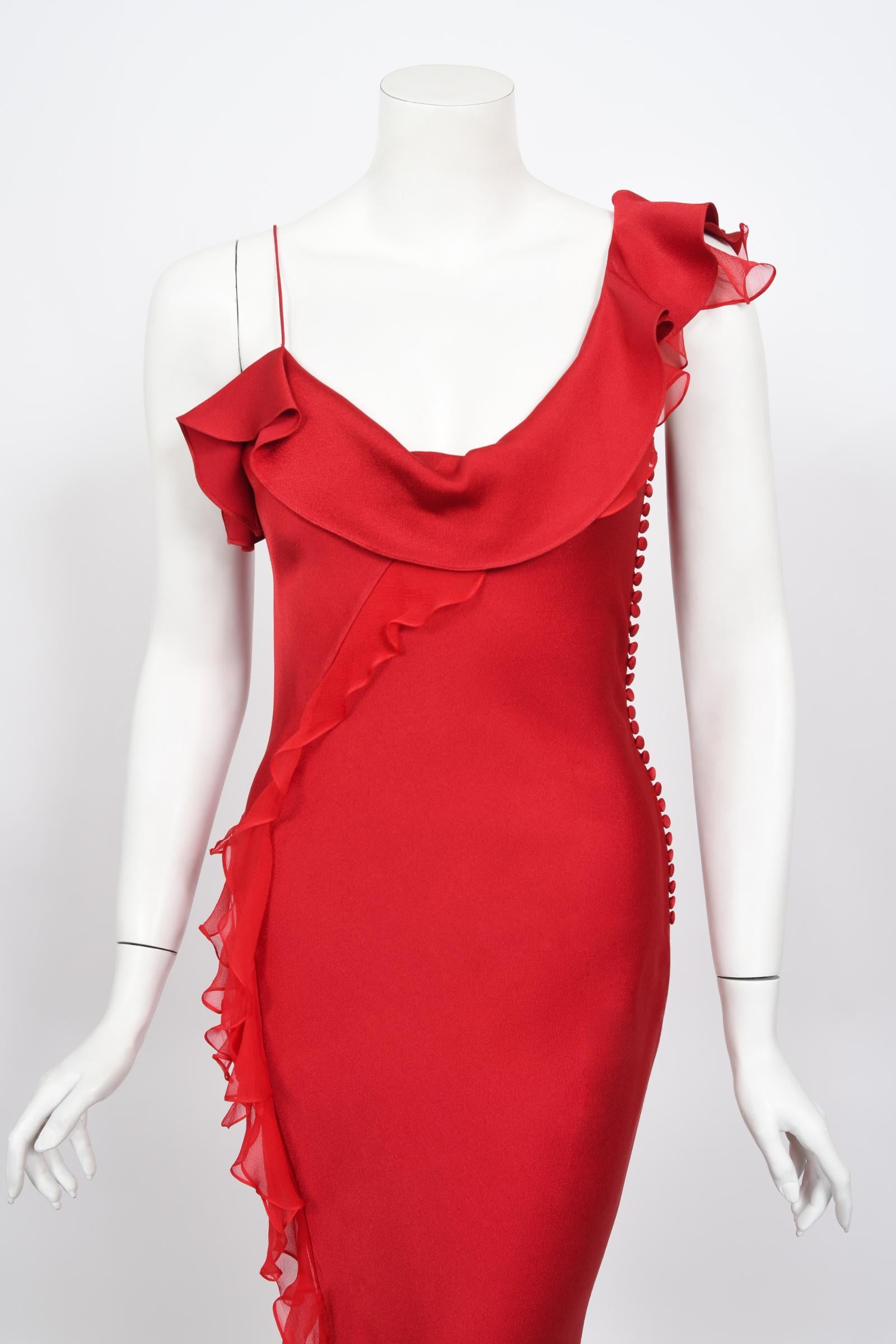 An incredibly chic and ultra flattering Christian Dior 
 ruby red bias-cut gown from John Galliano's stunning 2003 spring-summer collection. John Galliano is widely considered one of the most innovative and influential fashion designers of the early