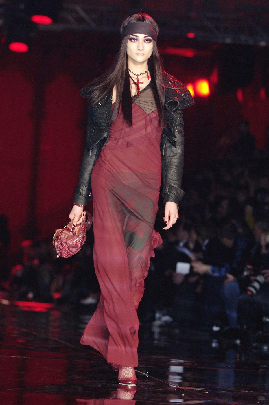 Breathtaking Christian Dior beaded floral burgundy silk chiffon bias-cut gown. Dior is probably the best known name in high fashion since the late 1940's. This stunning Christian Dior gown from John Galliano's iconic 2006 fall-winter collection is a