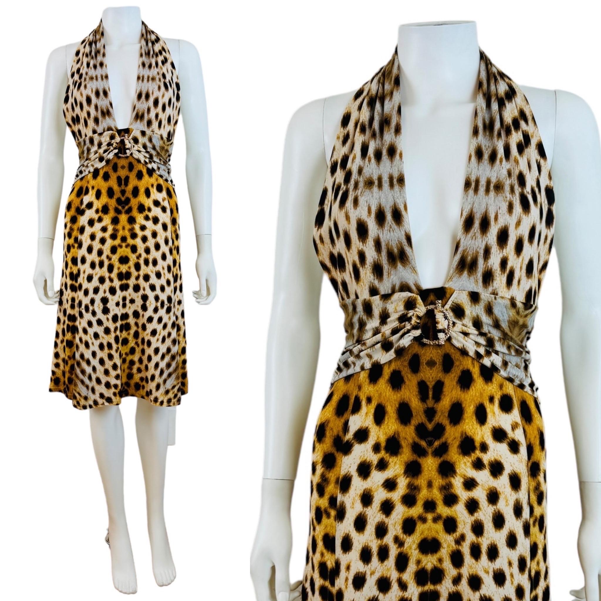 Vintage 2007 Roberto Cavalli Dress
Stretch fabric with cheetah print
Halter neckline
Low cut
Gold metal closure detail at the bust
Gathered fabric band at the waist
Knee length A line skirt
Open low cut back
Lined on bust only
Slips on