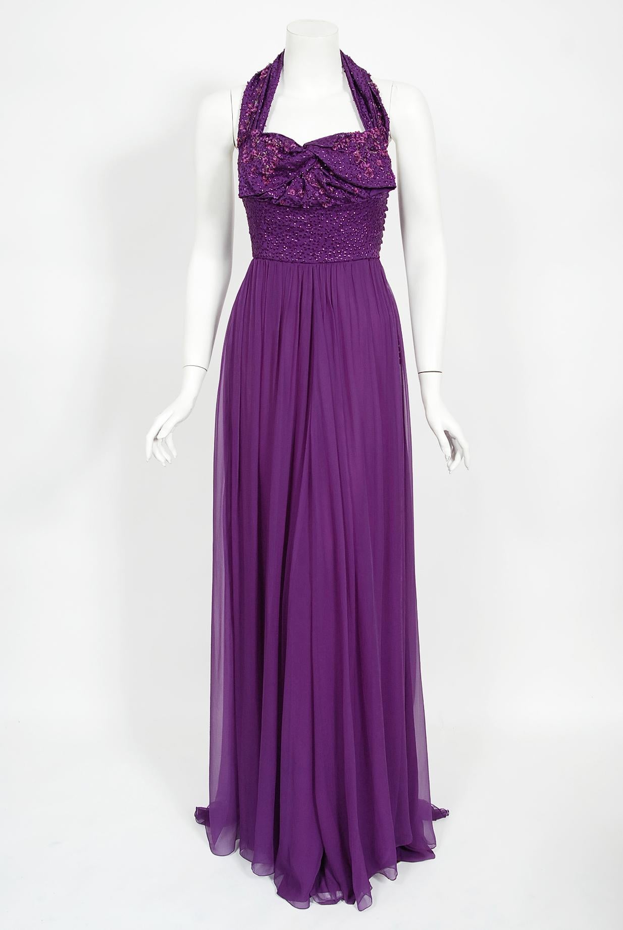 A simply stunning and totally timeless Christian Dior beaded, embroidered purple silk gown from John Galliano's 2009 spring-summer collection. John Galliano is widely considered one of the most innovative and influential fashion designers of the
